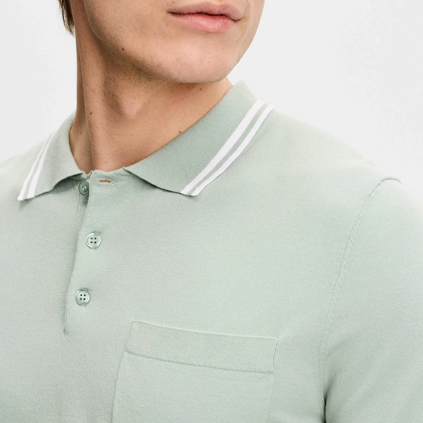 Close View of J Lindeberg Knitted Polo in Soft Green