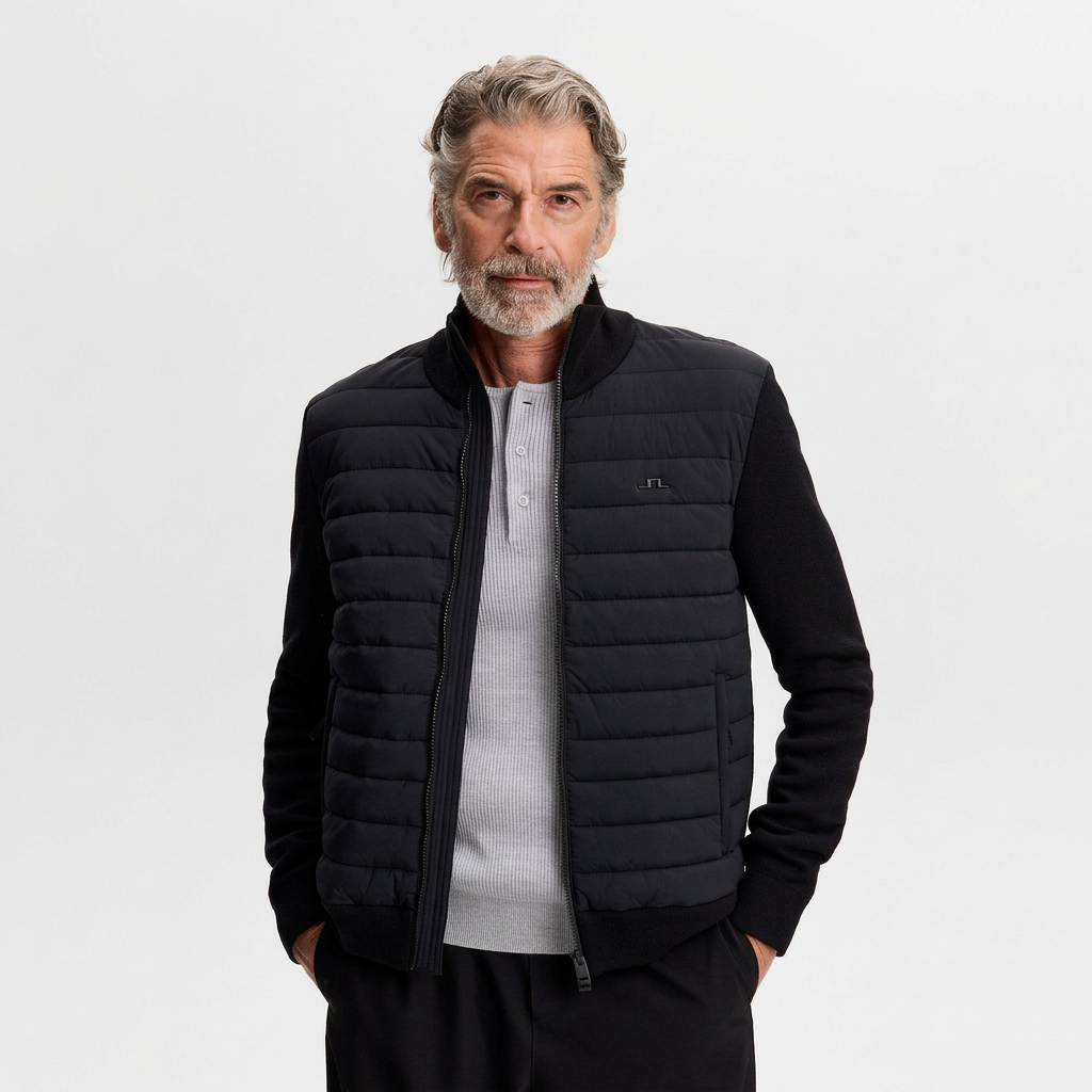 Front View of Model in J Lindeberg Boen Knitted Hybrid Jacket in Black