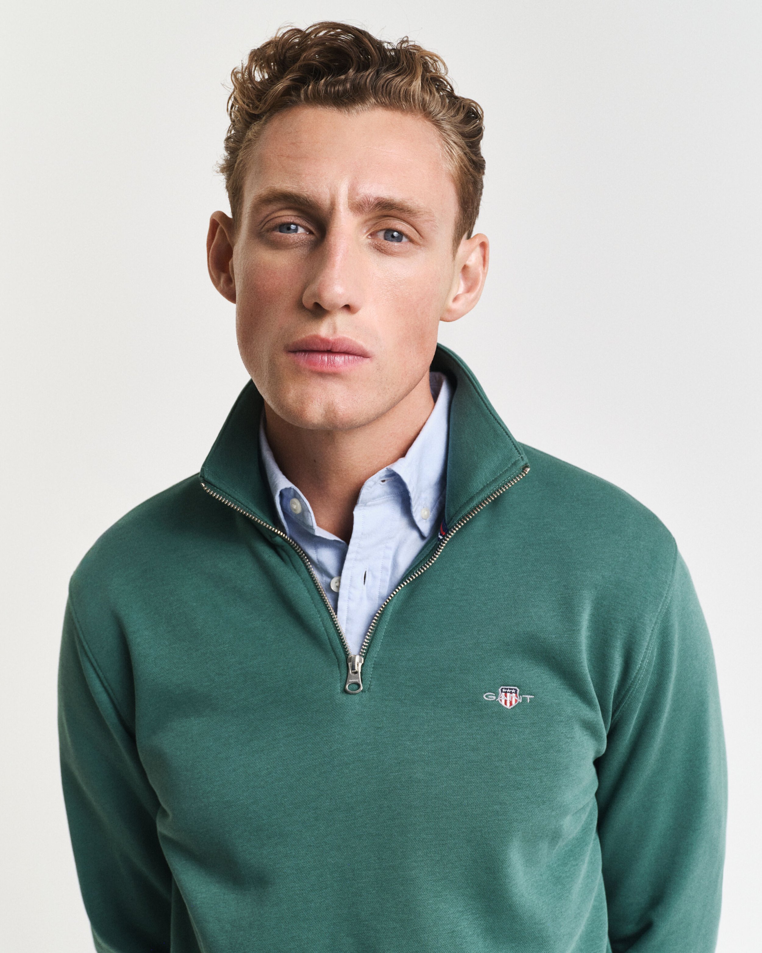 Close View of Model in GANT Cotton Half Zip Jumper in Soft Green