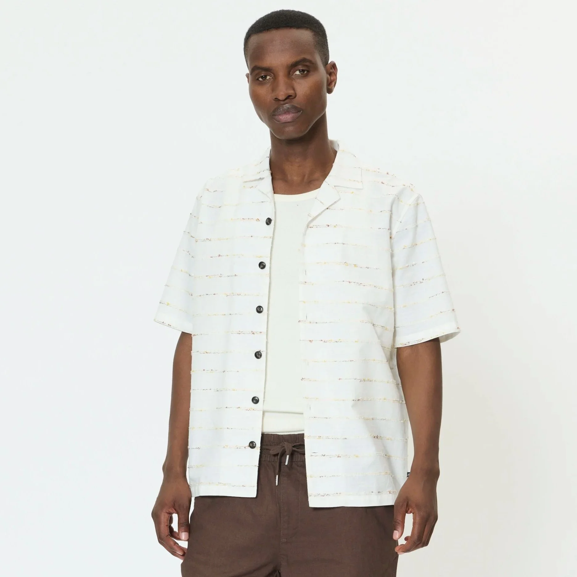Model View of Matinique Stripe Cotton and Viscose Short Sleeve Shirt in White and Sand