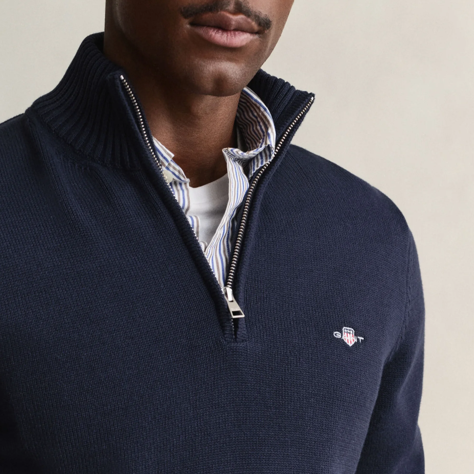 Close View of Model in GANT Cotton Knit Half Zip Jumper in Evening Blue
