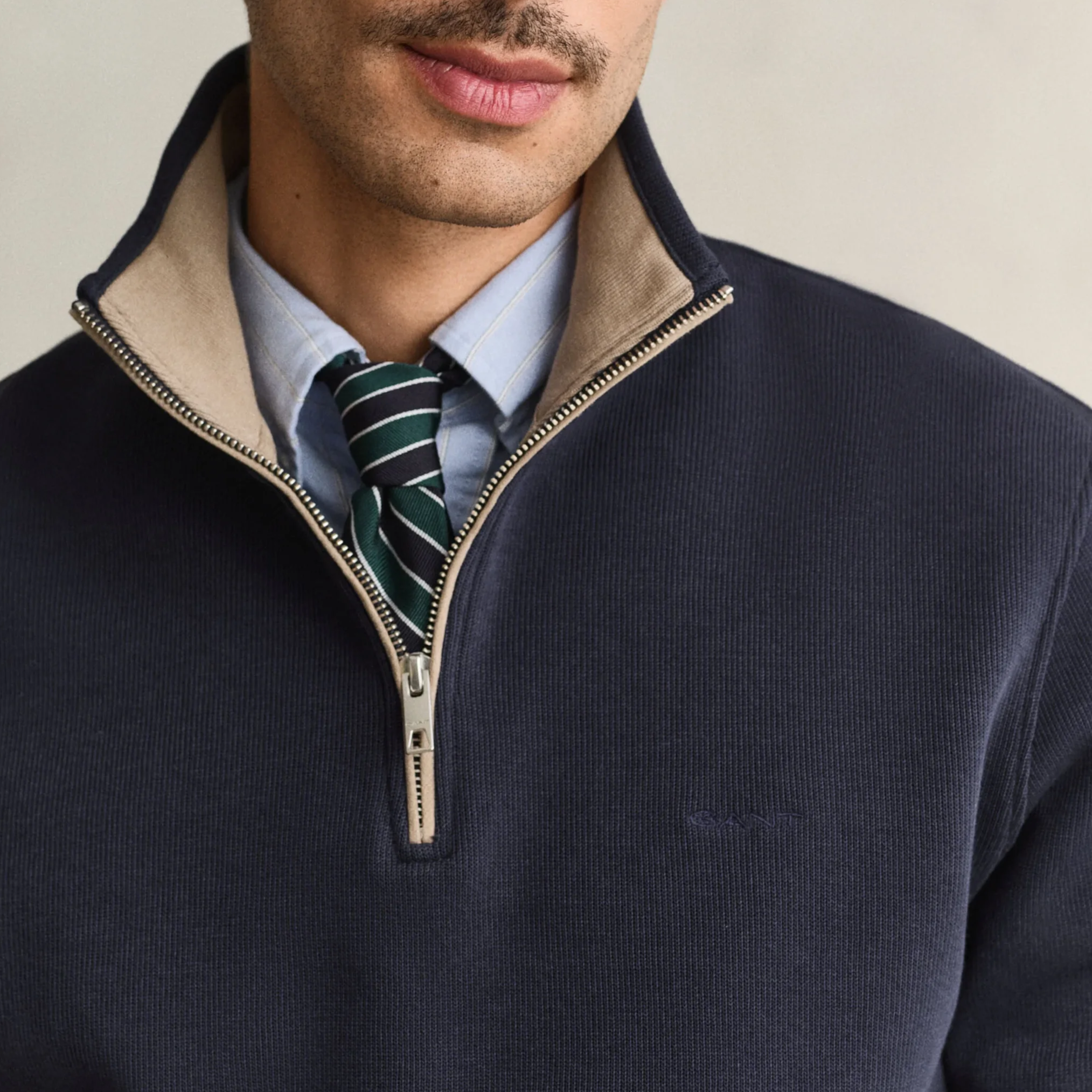 Close View of Model in GANT Sacker Rib Half Zip Jumper in Evening Blue