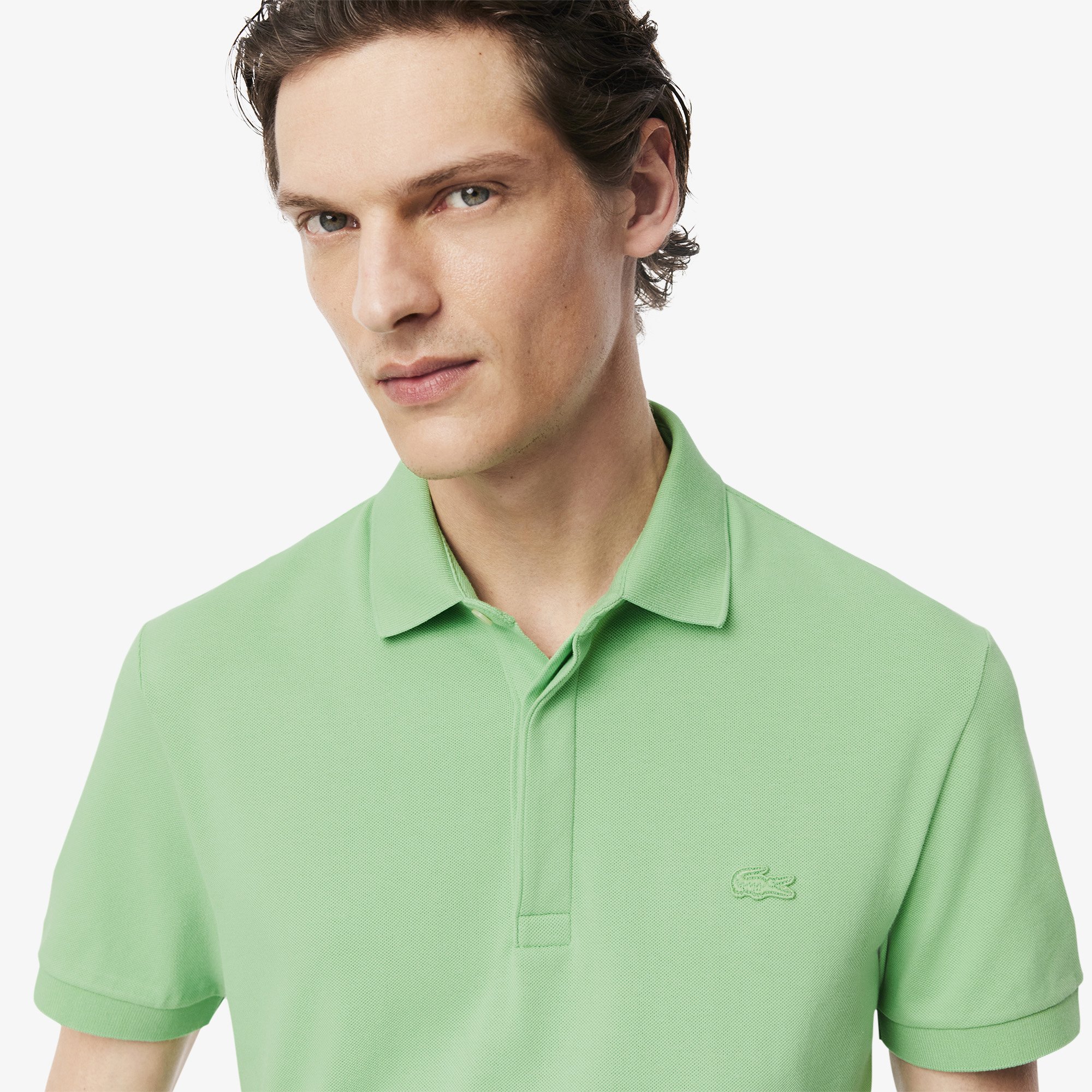 Close View of Model in Lacoste Paris Piqué Polo Shirt in Apple Green