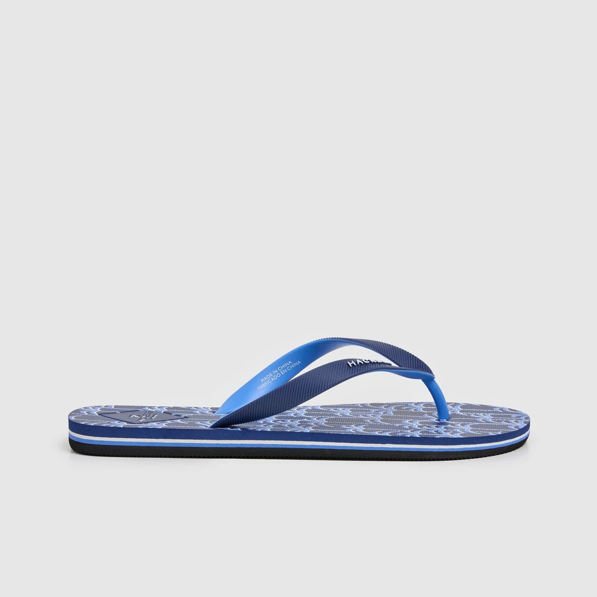 Side View of Hackett Palm Tree Flip Flop in Navy