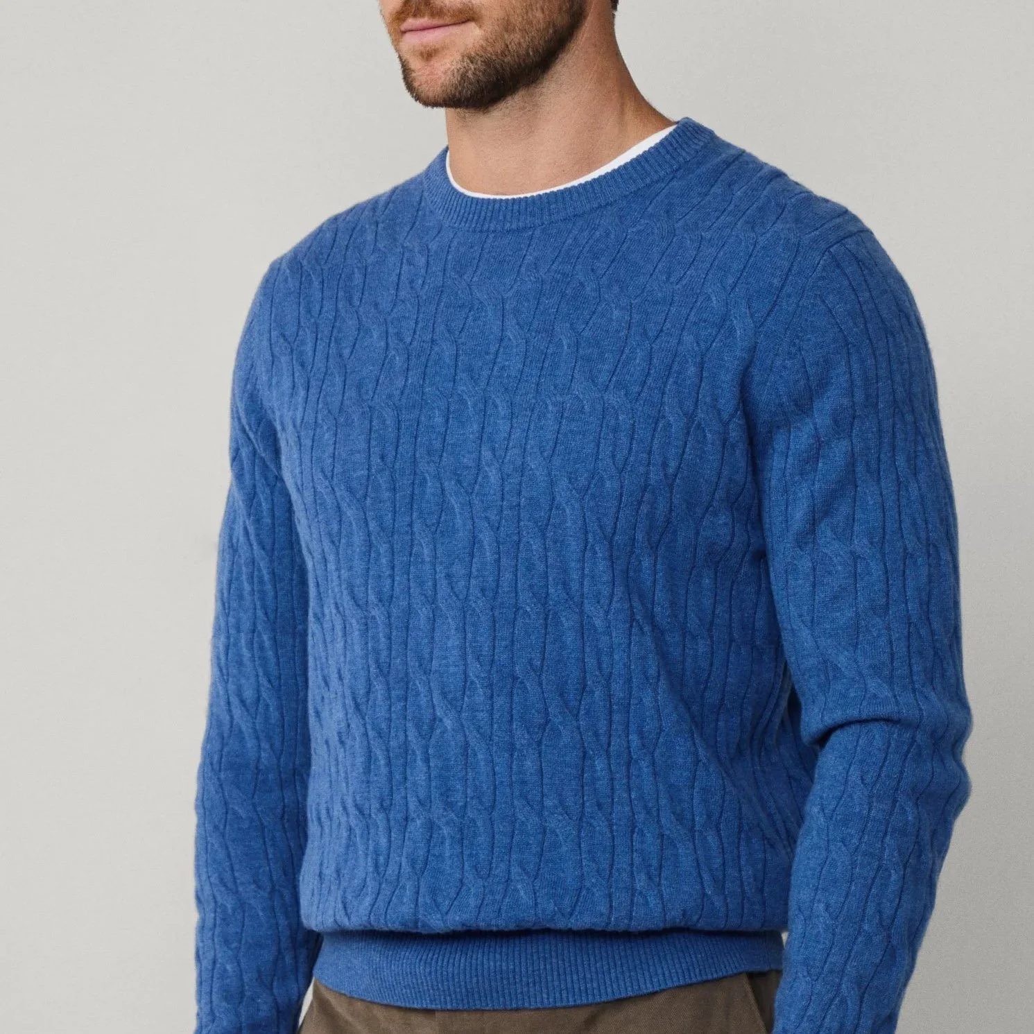 Model View of Hackett Lambswool Cable Jumper in Mid Blue