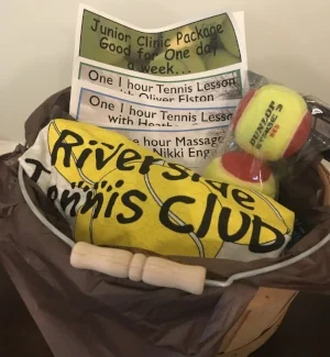 TENNIS ANYONE? BASKET You're never too young to learn to play tennis! This basket includes (2) private one-hour lessons, junior clinic package, a massage, T-shirt, and a set of balls. DONOR: Riverside Tennis Club VALUE: $260