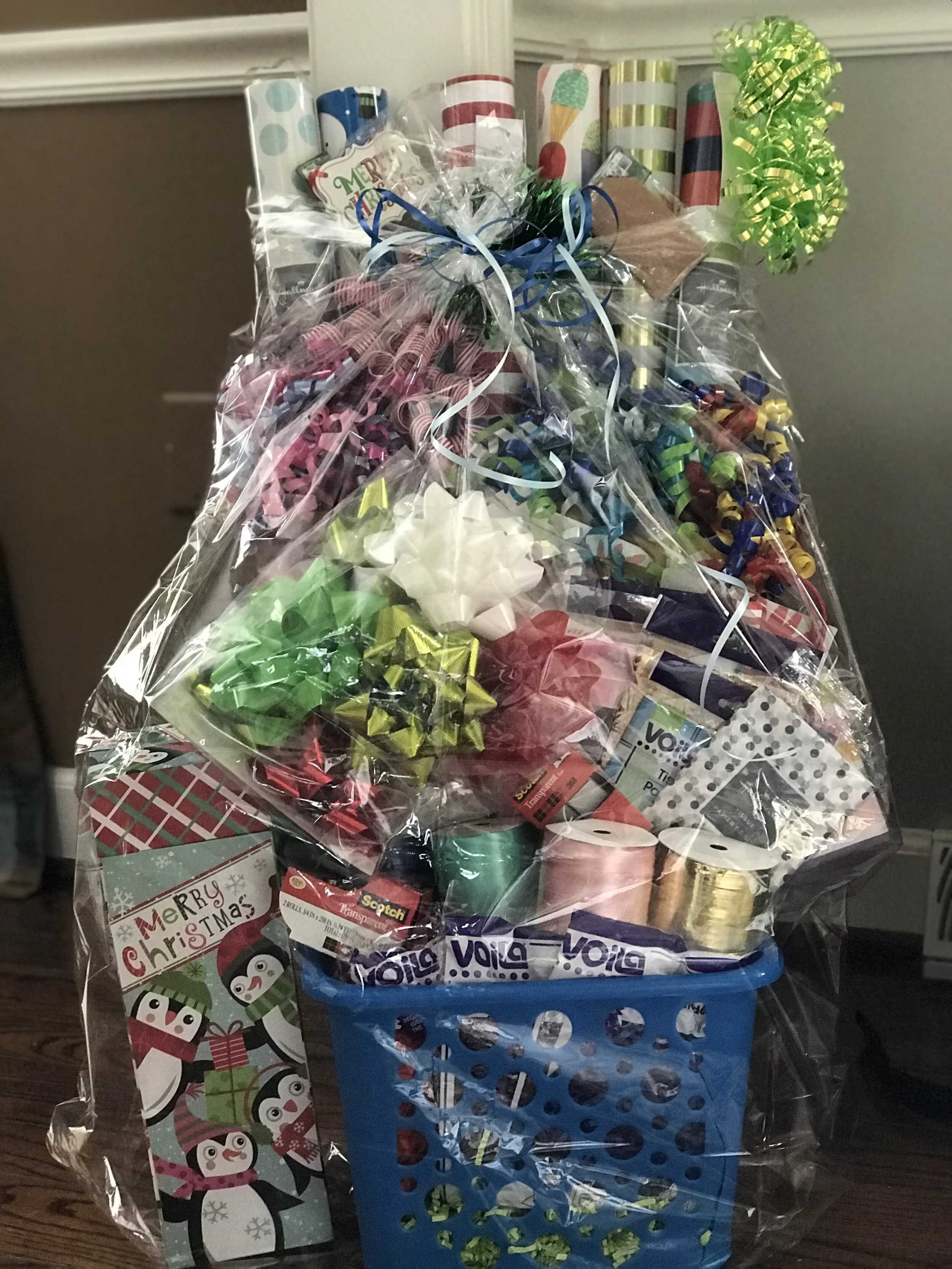 “WRAP IT UP” ALL OCCASION WRAPPING BASKET Don’t get caught in a bind when you are running late to the 3rd birthday party of the weekend or that last minute gift you remembered for the 10th holiday party of the season...this basket has all of your wrapping needs covered and all nicely organized in an awesome rolling storage basket! DONOR: 4th Grade Classes VALUE: $100
