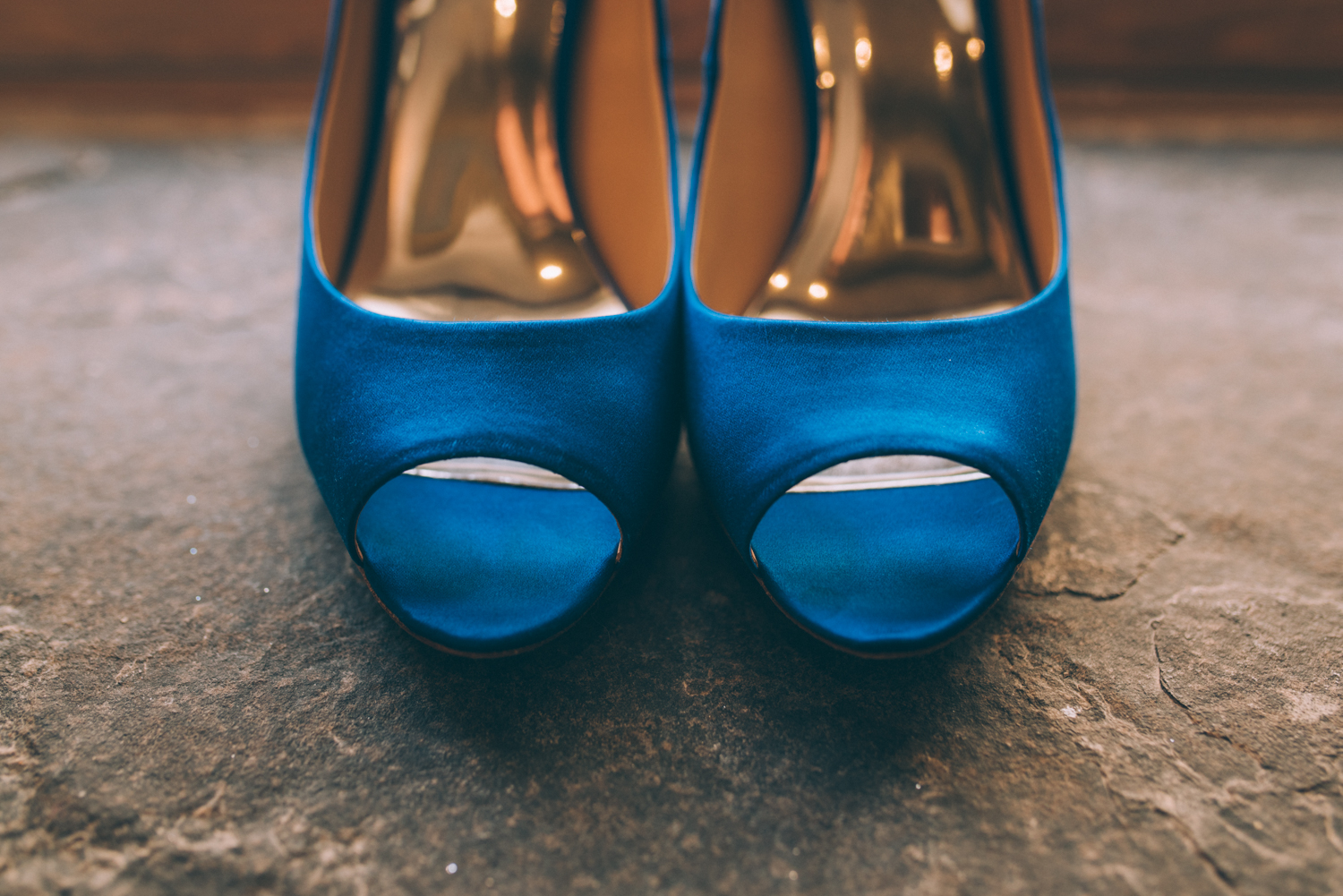 Ancaster Mill Wedding with Sounds like yellow photography- blue wedding shoes