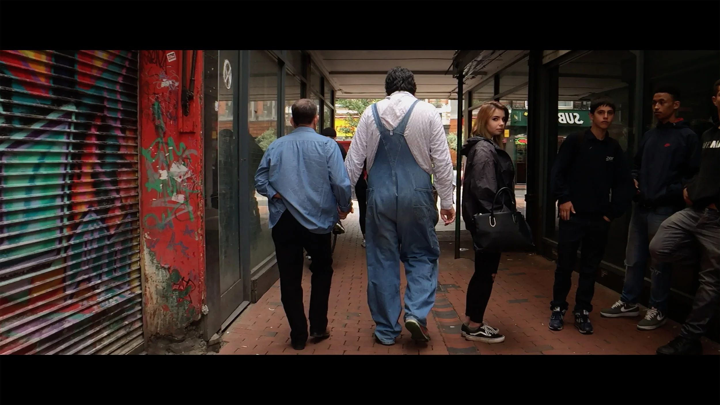 walkingholdingHIGHRES.jpg