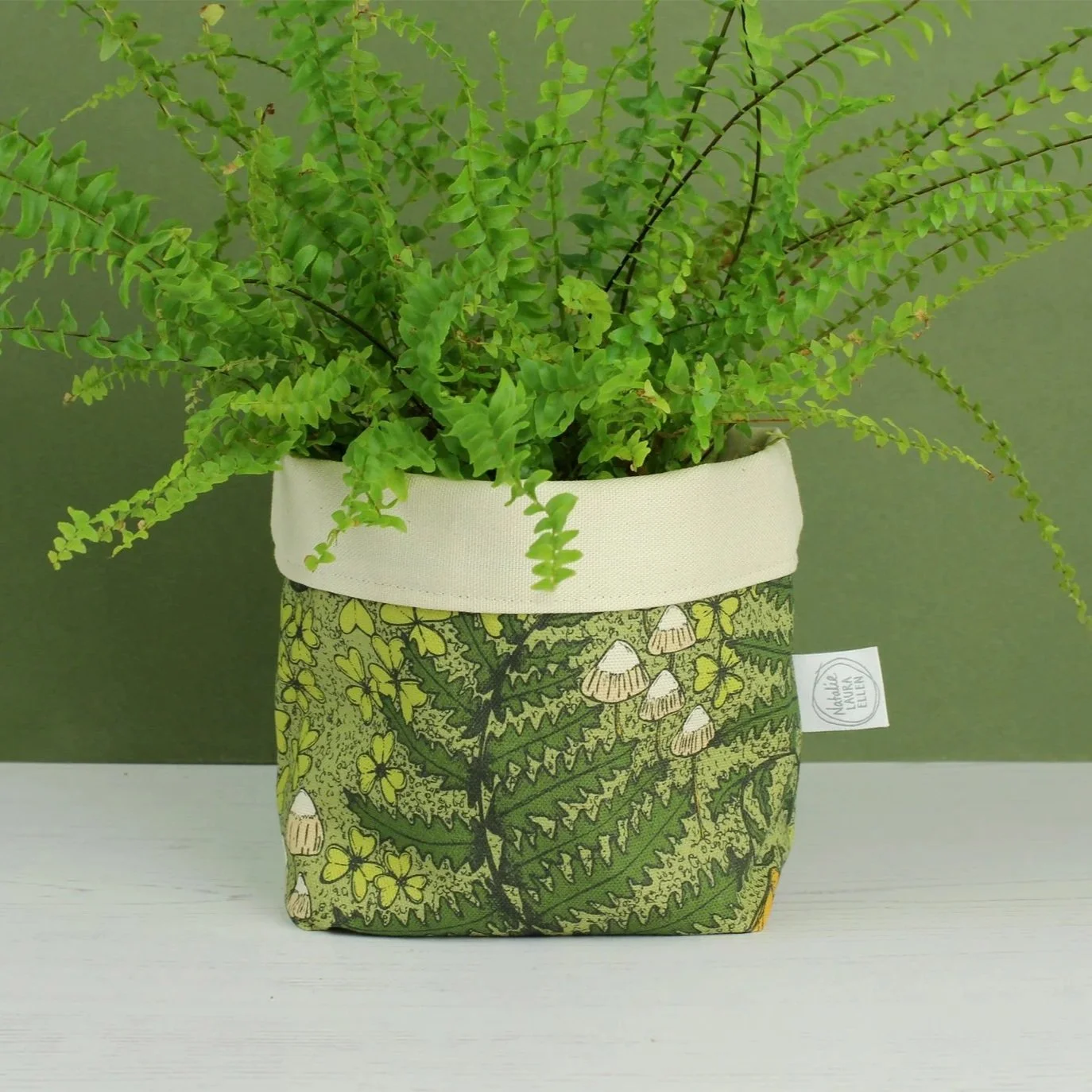 Forest floor green fabric storage / plant pot