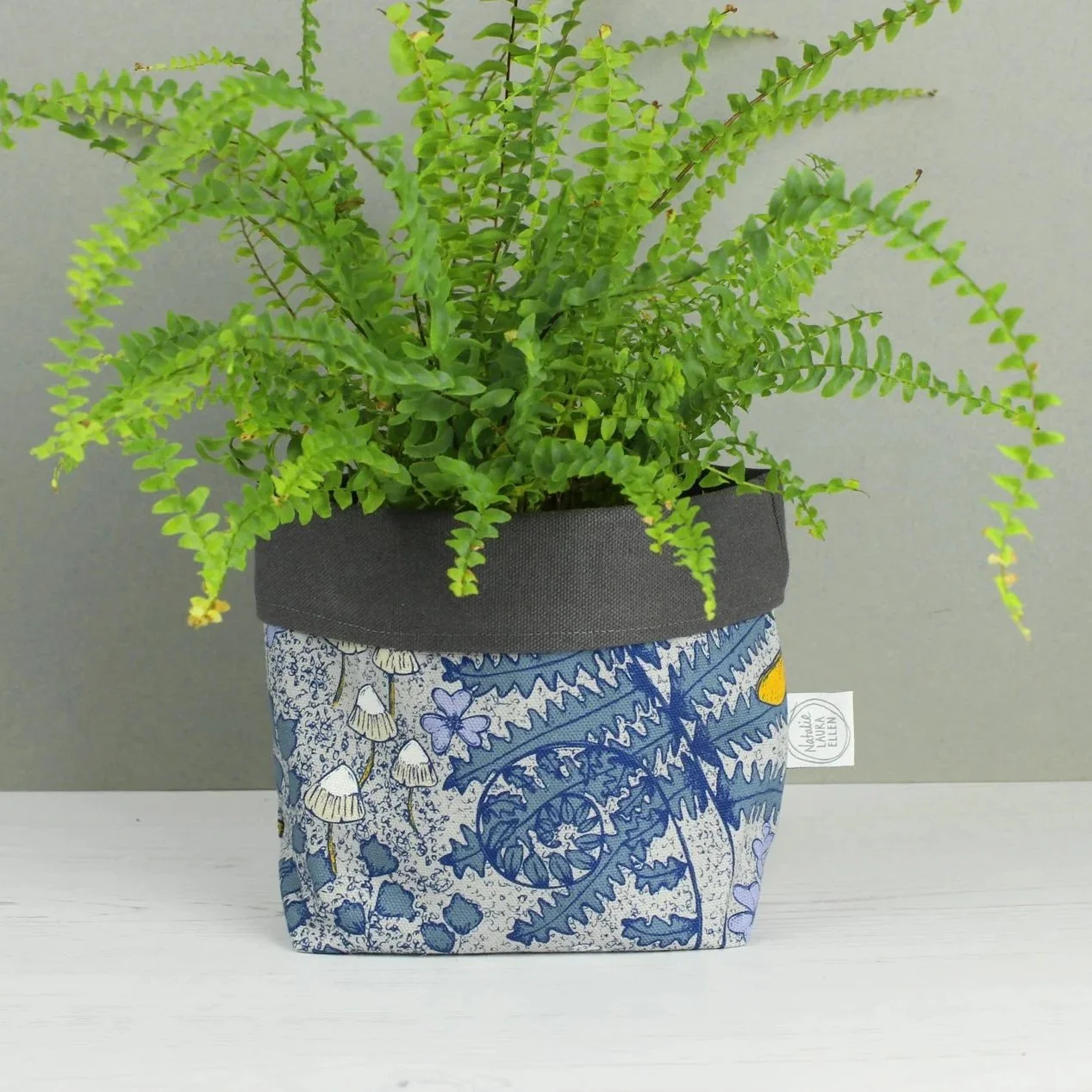 Forest floor blue fabric storage / plant pot