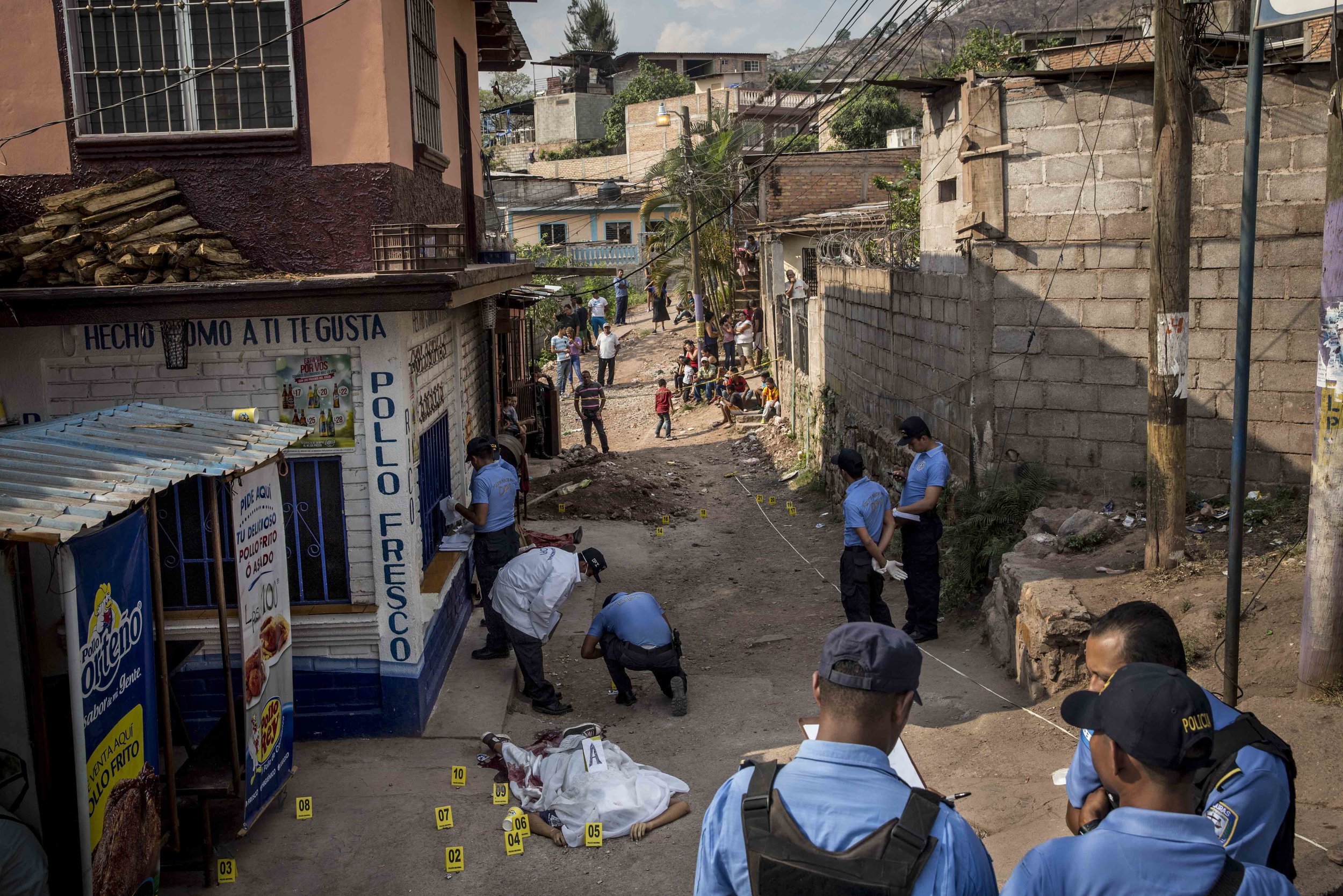 The crime scene of the murder of two brothers, Carlos Amador 22, and Edwin Amador, 20, murdered in cold blood in the streets of the Suyapa district, Teguciaglpa, capital of Honduras.