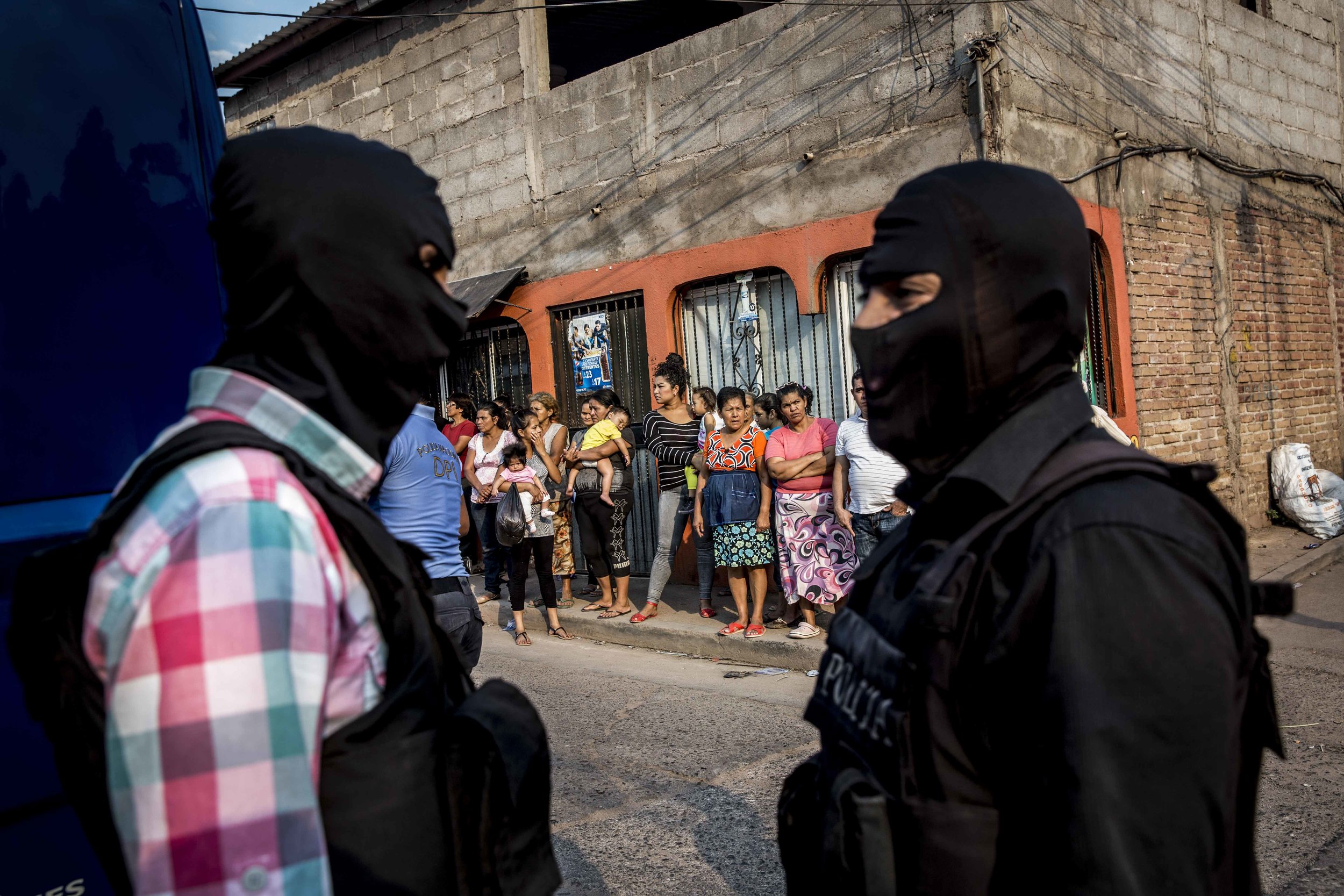 Police on the site of the murder of two brothers, Carlos Amador 22, and Edwin Amador, 20, murdered in cold blood in the streets of the Suyapa district, Teguciaglpa, capital of Honduras.