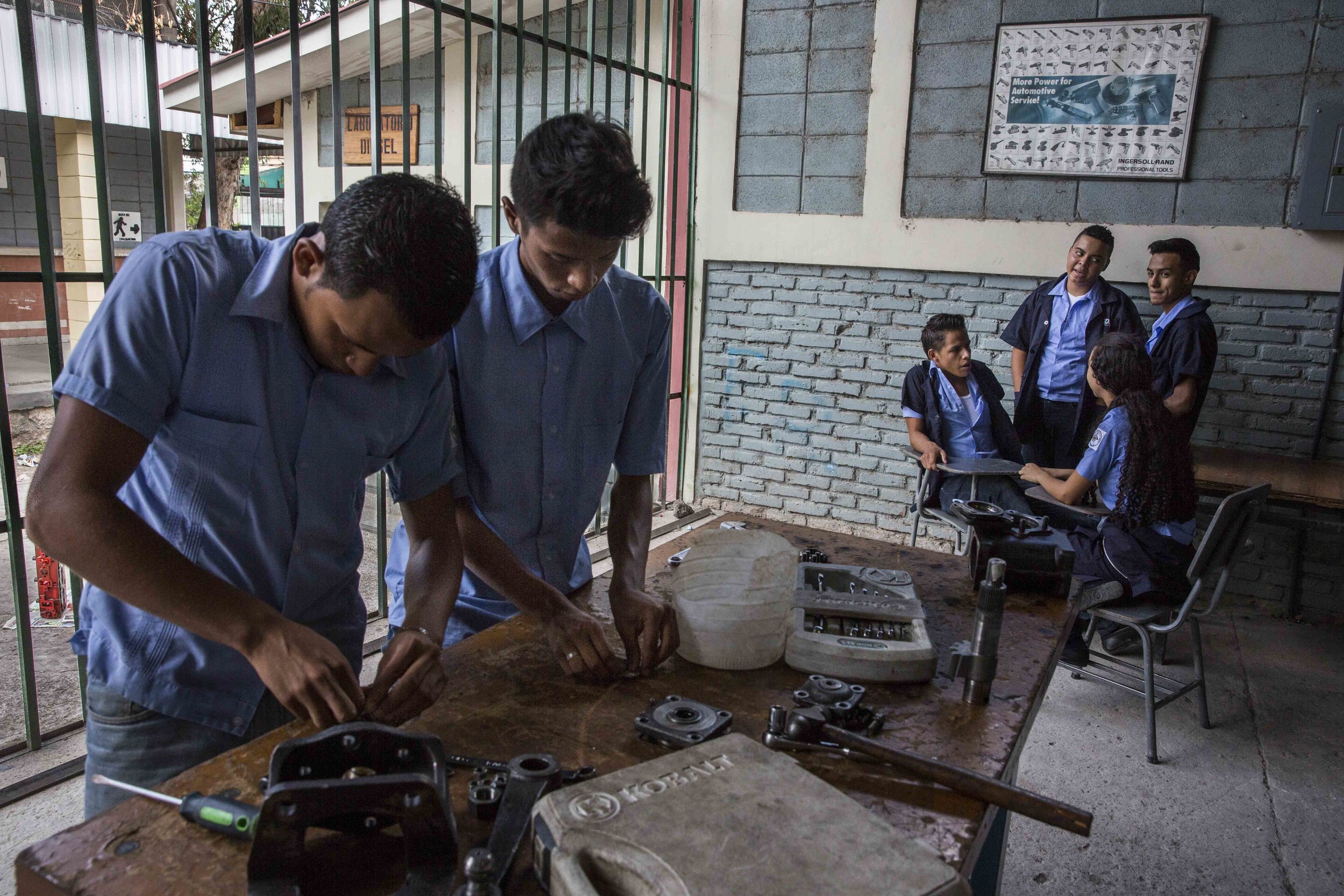 Boy and girls inside the premieres of a school in a vocational school of the capital Tegucigalpa. This neighborhood under the control of the 18 Street Gang (M-18). The M-18, it is also known as the army of the children, because of the age of the mem