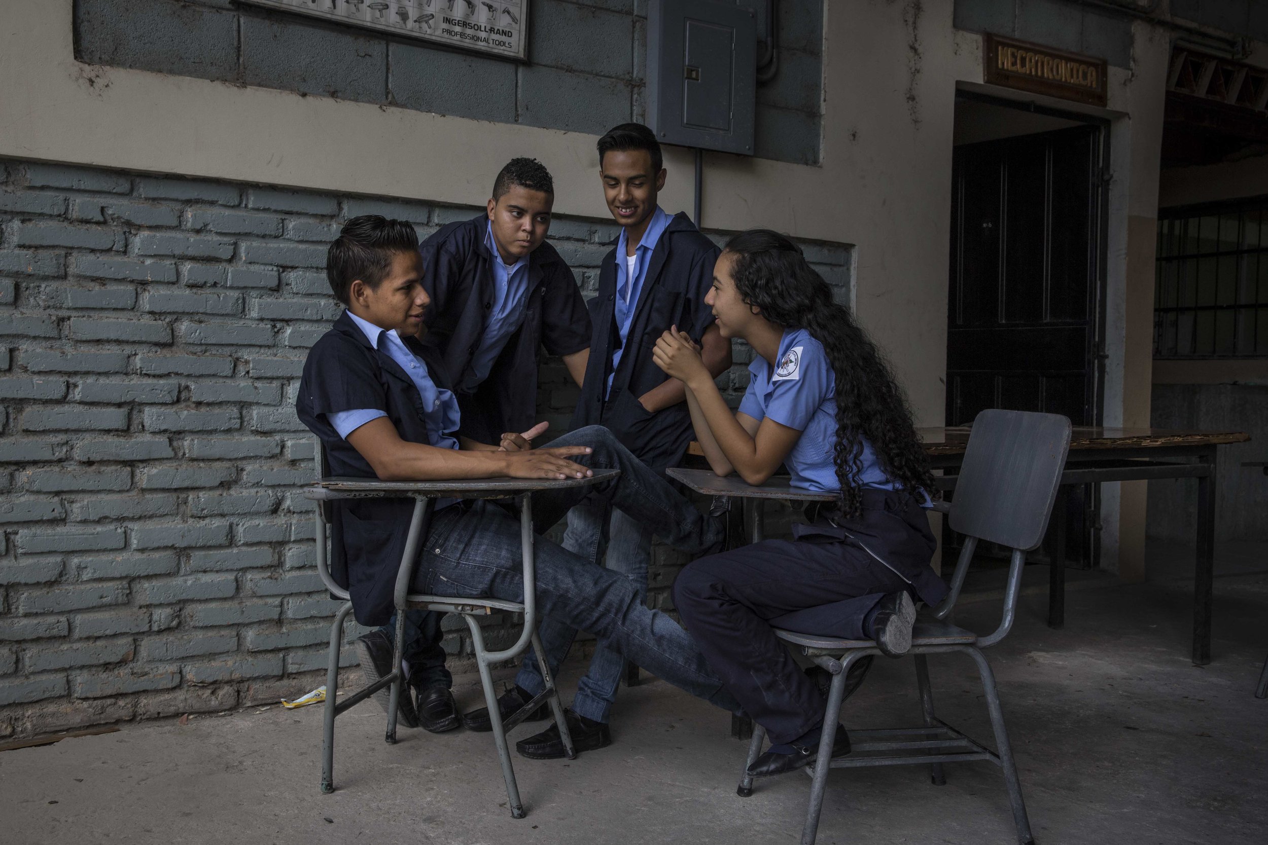 Boy and girls inside the premieres of a school in a vocational school of the capital Tegucigalpa. This neighborhood under the control of the 18 Street Gang (M-18). The M-18, it is also known as the army of the children, because of the age of the mem