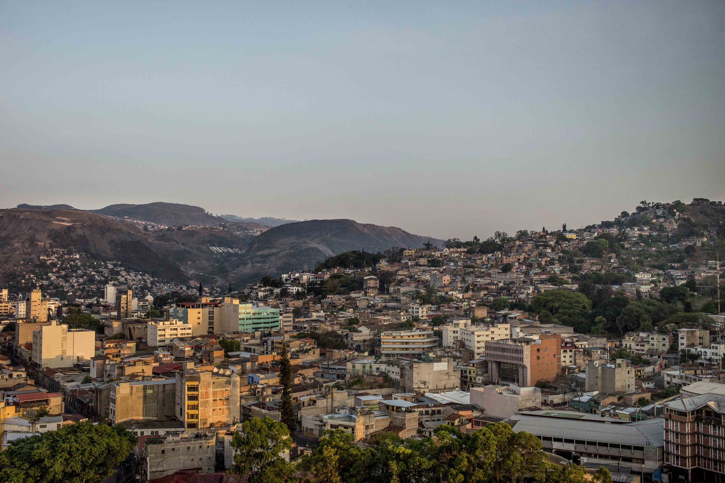 Tegucigalpa at dawn, capital of Honduras. Youngsters tend to leave the countryside areas, a hotbed of violent con ict over land, to pour into big the two major cities of Honduras, Tegucigalpa and San Pedro Sula, where they find no jo