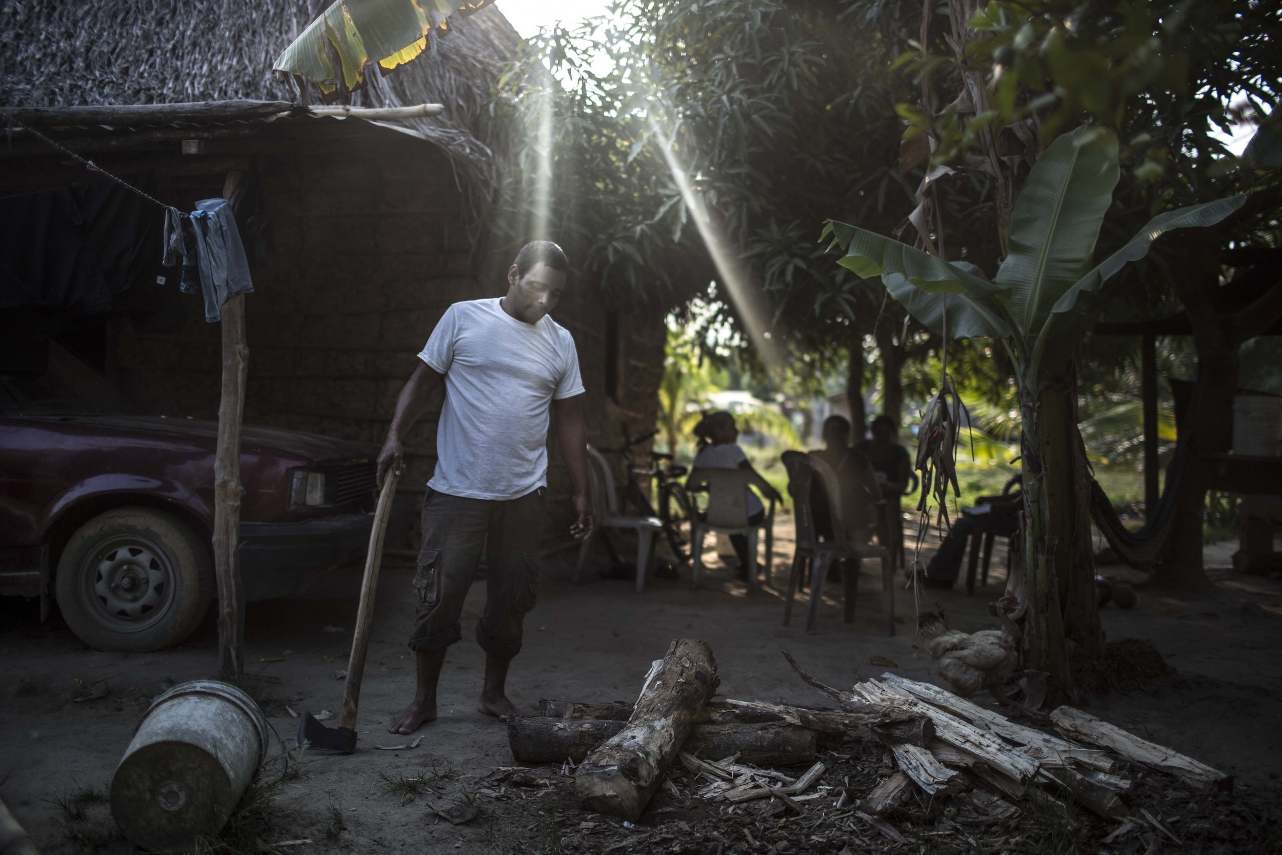 A man in front of his house in the campesino community of Guadalupe Carney in Aguán region, not far from the city of Tocoa in the department of Colon, on the Atlantic coast of Honduras. Community members denounce intimidations by private securi