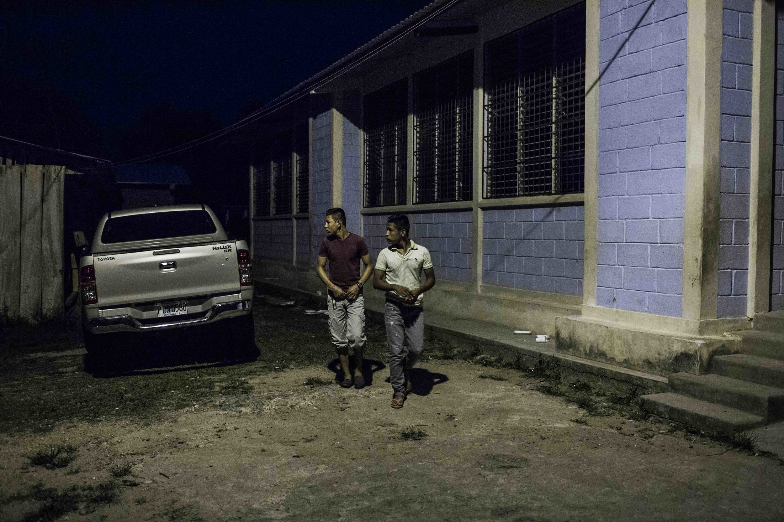Young men in the football field of the Guadalupe Carney community, outside the city of Tocoa in the department of Colon, Aguan valley, on the Atlantic coast of Honduras. Insecurity in the Aguan valley has an active role in displacing people from the