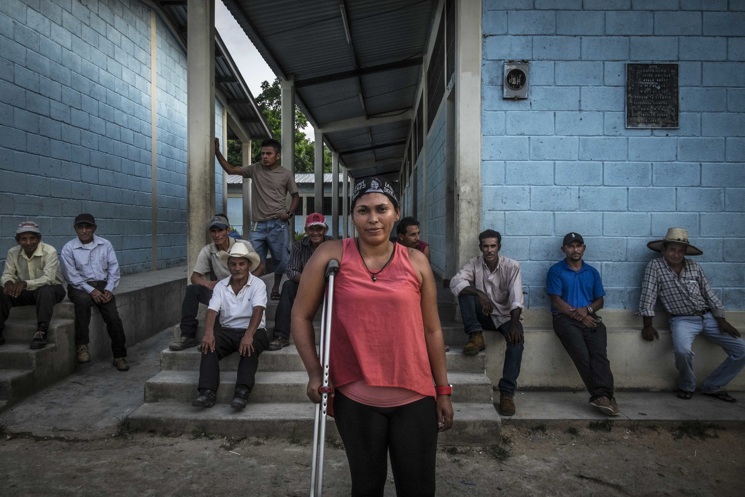 Lemus Irma Amaya, along with members of the small community Guadalupe Carney, outside the city of Tocoa in the department of Colon, Honduras. Irma is the coordinator of (OPDHA) Permanent Observatory of human rights in the Bajo Aguan, representative