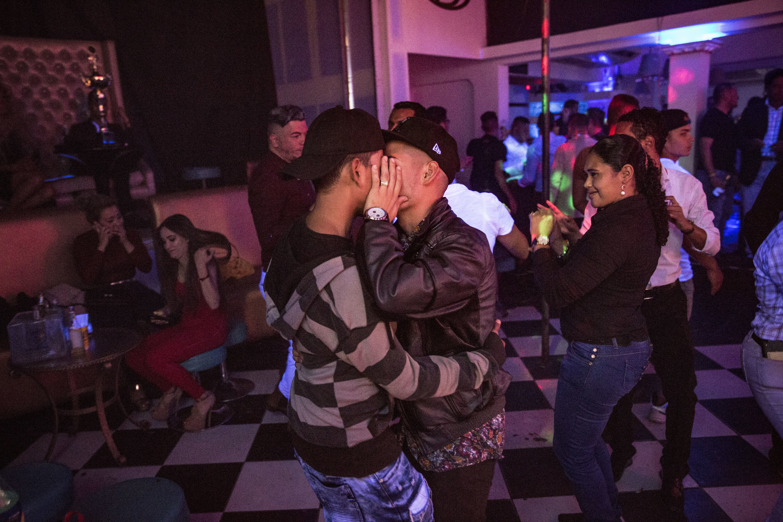  A couple kissing in a gay friendly club in Tegucigalpa.  