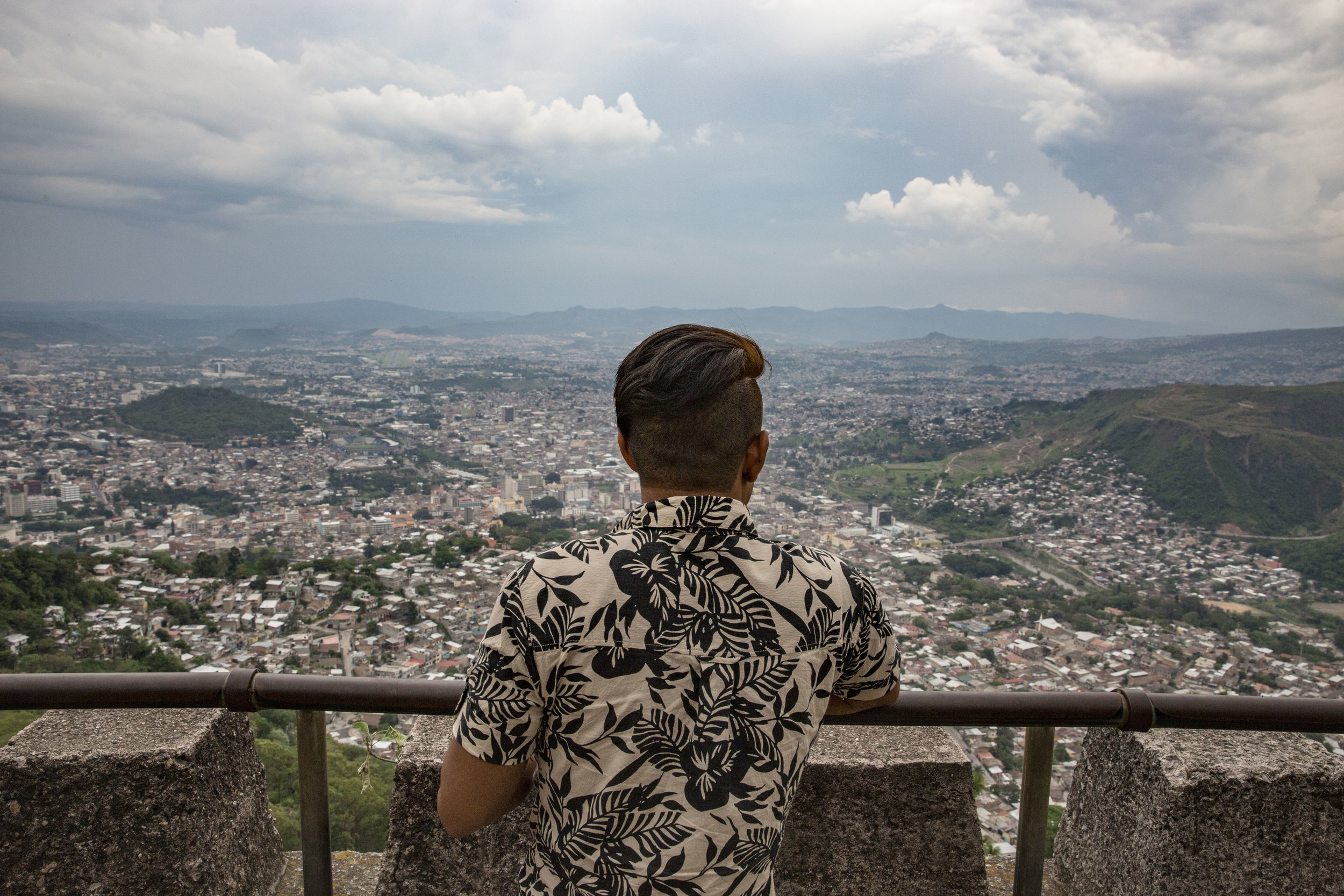 Darwin overlooking Tegucigalpa, where he lives. Darwin is not safe, he has been threaten by the same gang that murdered his brother.