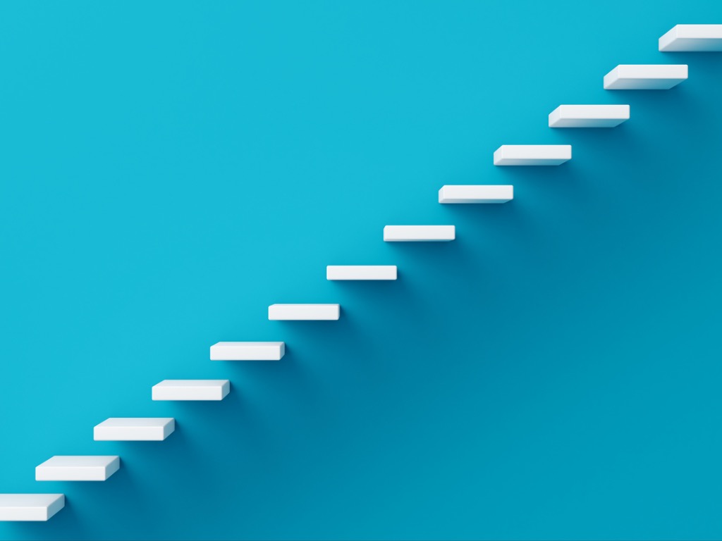 3d-stairs-on-isolated-blue-background-picture-id480488756.jpg