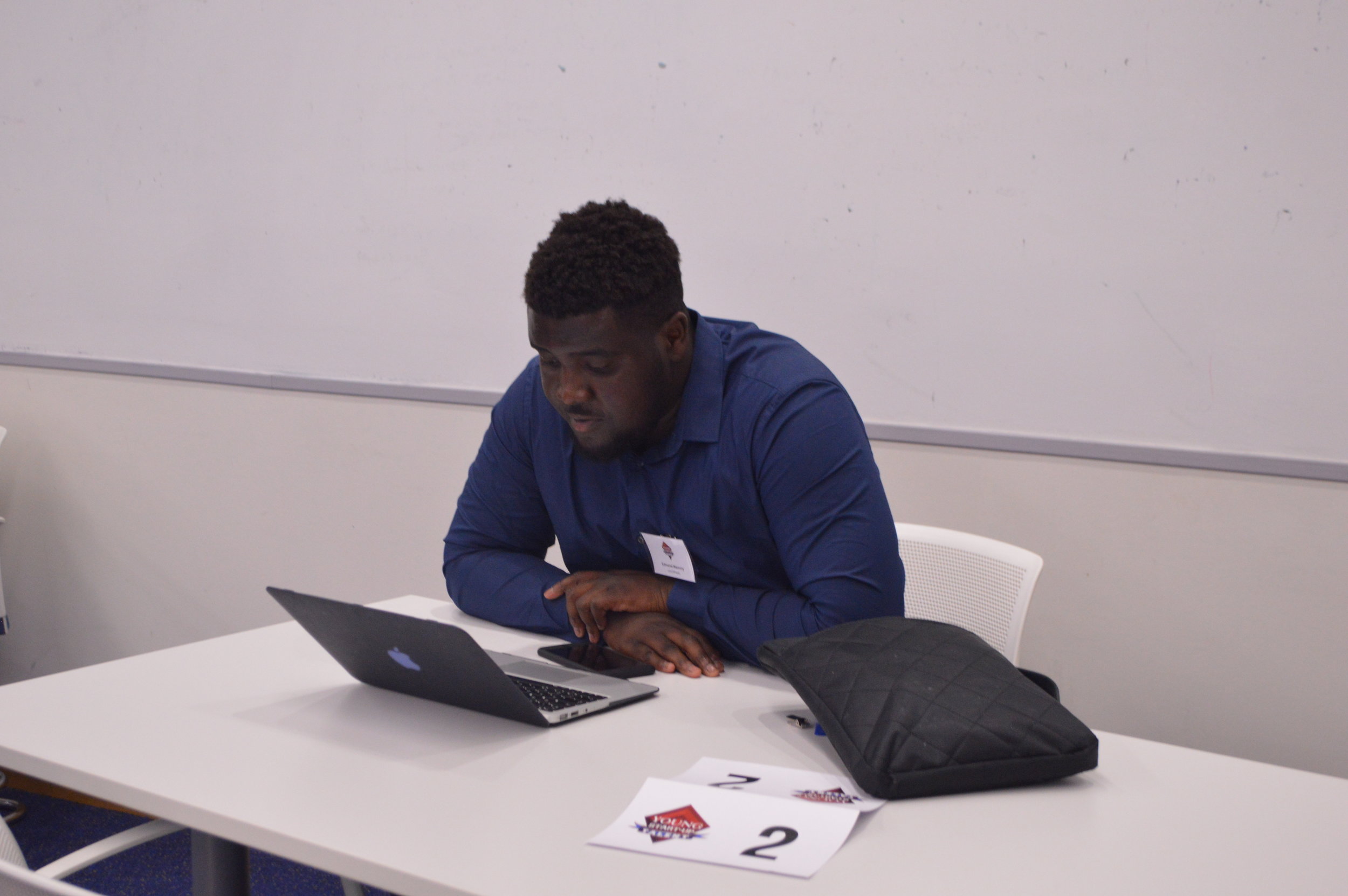 Edmond Mammy preparing his pitch to the judges. 