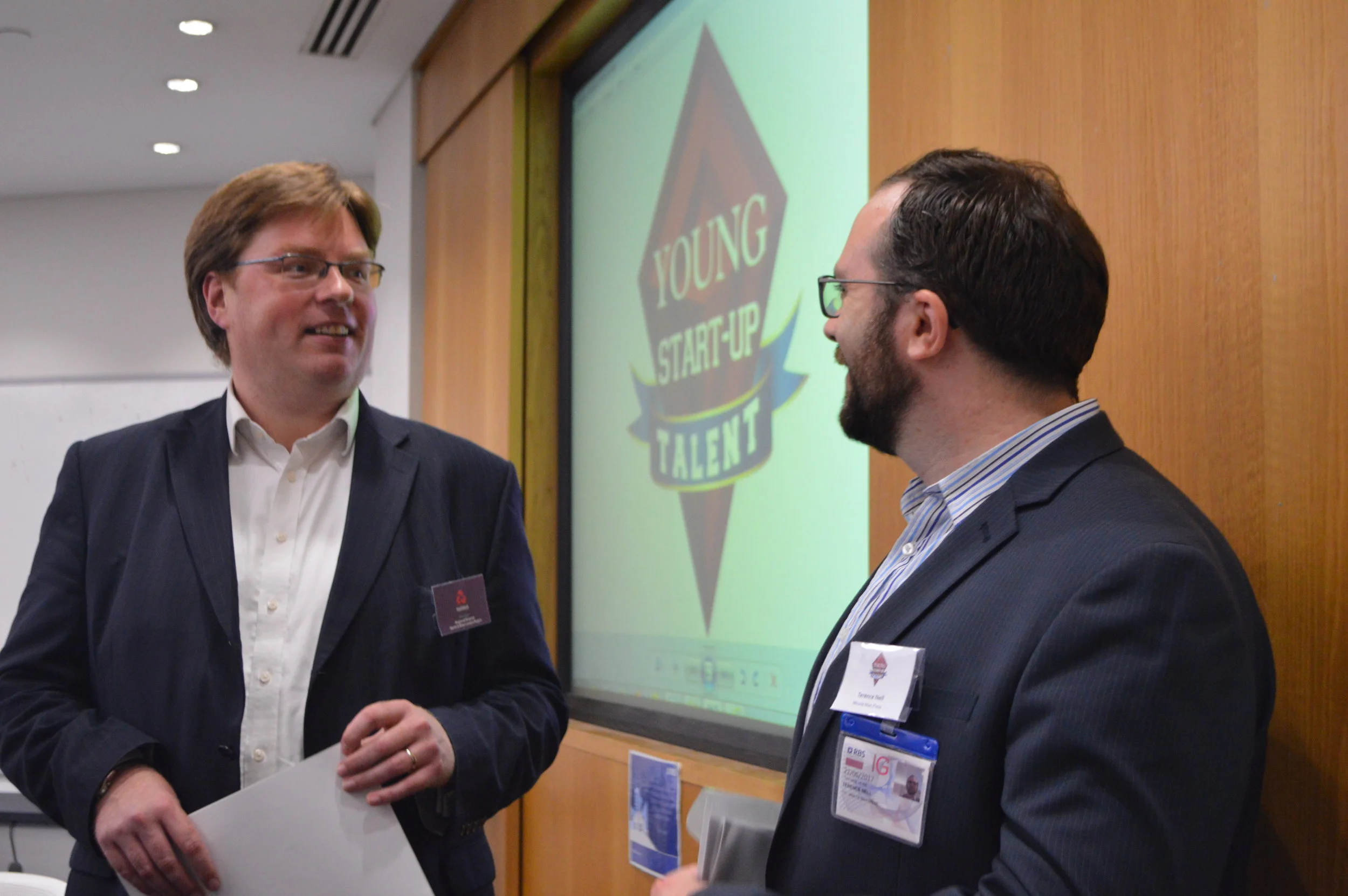 Phil Hall, the regional director of NatWest chatting to Terence Nell of Minute Man Press.