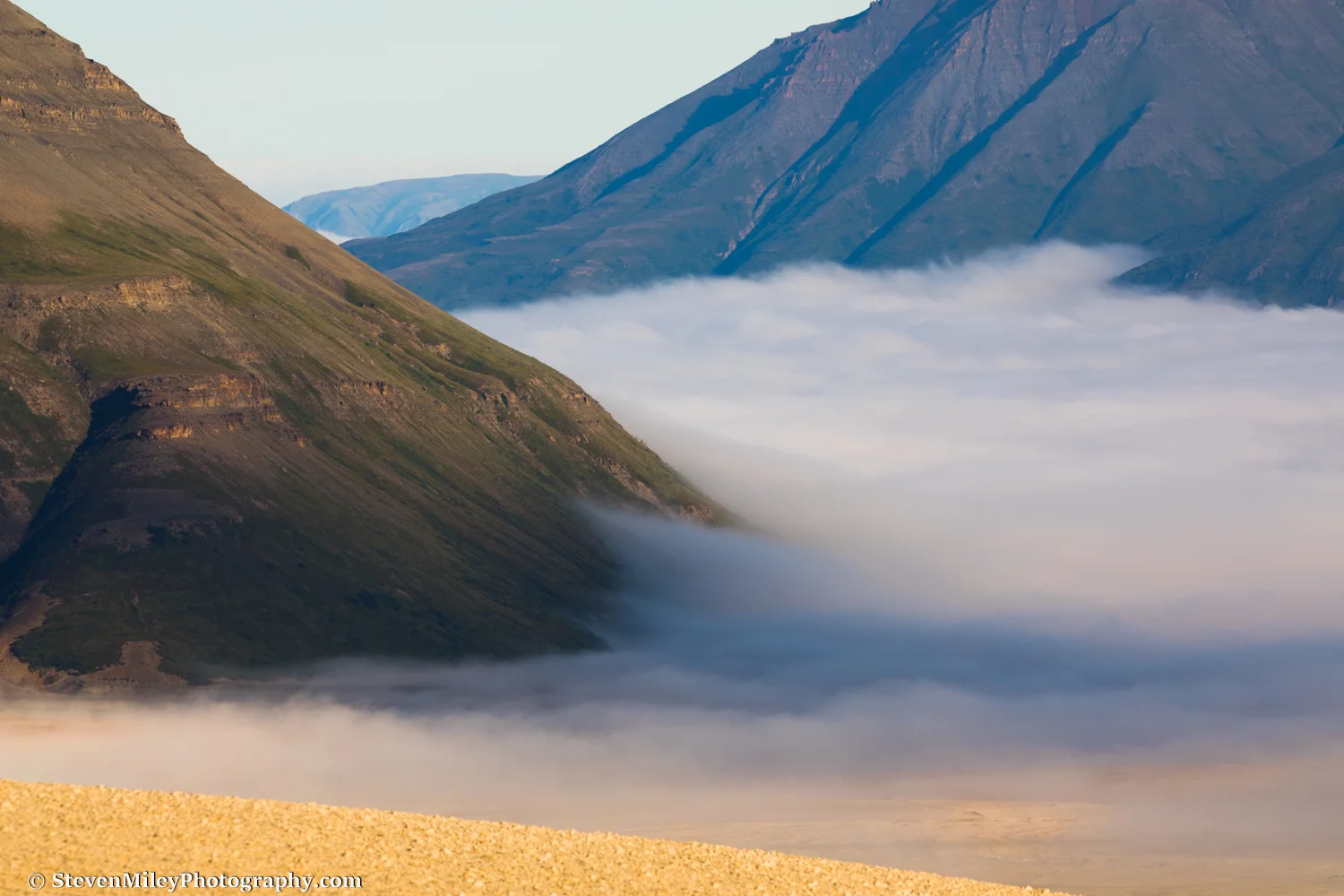 Morning fog blankets the lower Valley of 10,000 Smokes.