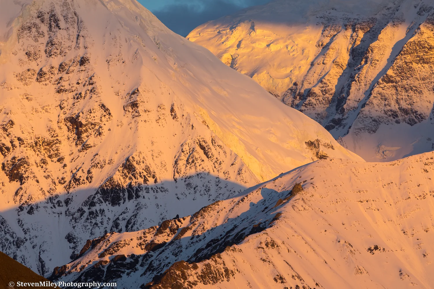 Crisscrossing ridges at sunrise. Mount Moffit is at upper right.