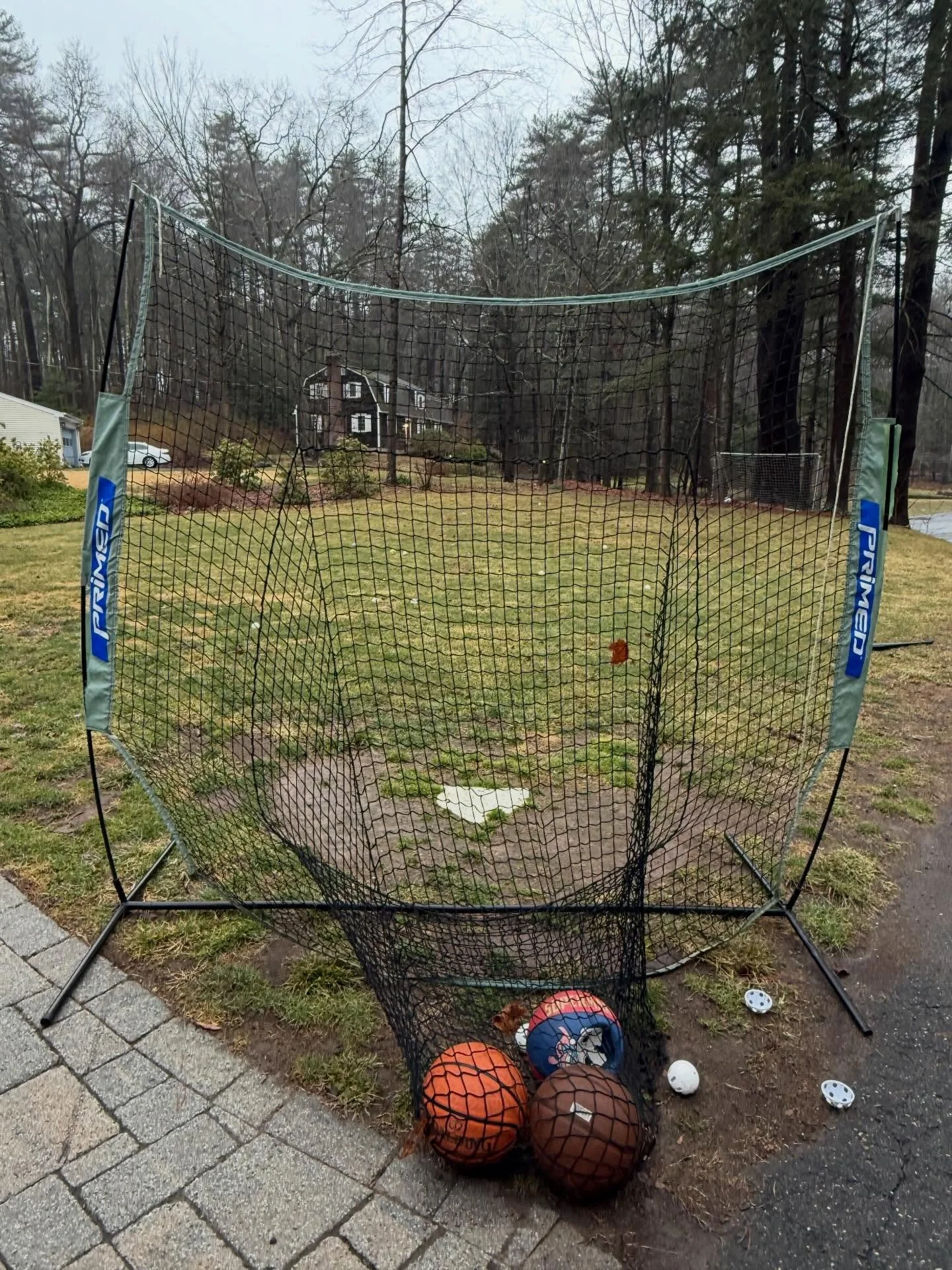 Gavin was home from college last weekend and I had been out.  I came home to the yard filled with wiffle balls and it made my heart smile to see that the boys had been playing ball together. 

I remember years ago when the boys put the bases down aro