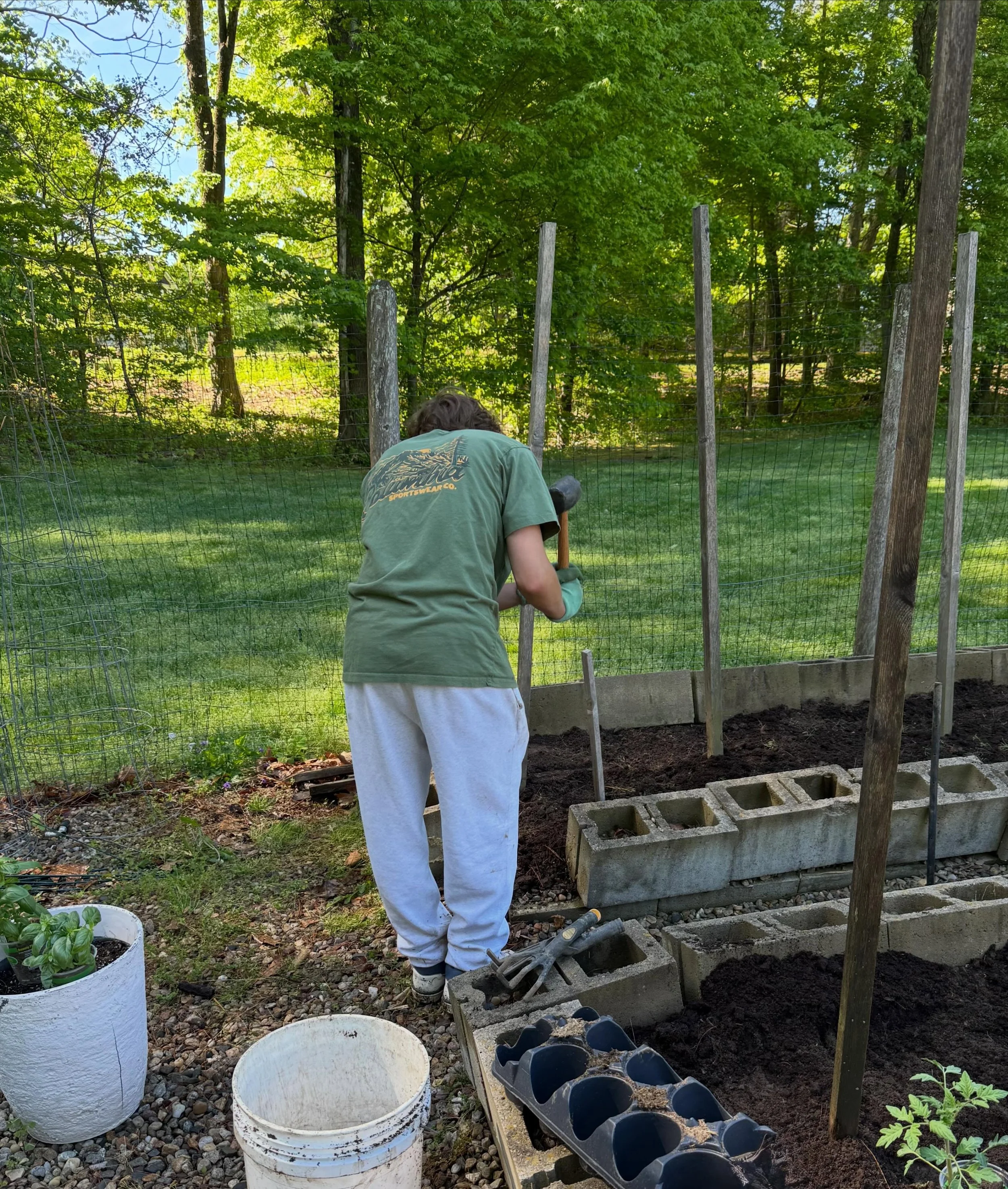 The other day Stephen, Matt, and I were volunteering at a local garden where we serve. The spout we normally use to hook up the hoses and water the plants is currently broken, so we brought gallon jugs to fill instead.

As we were filling up the jugs