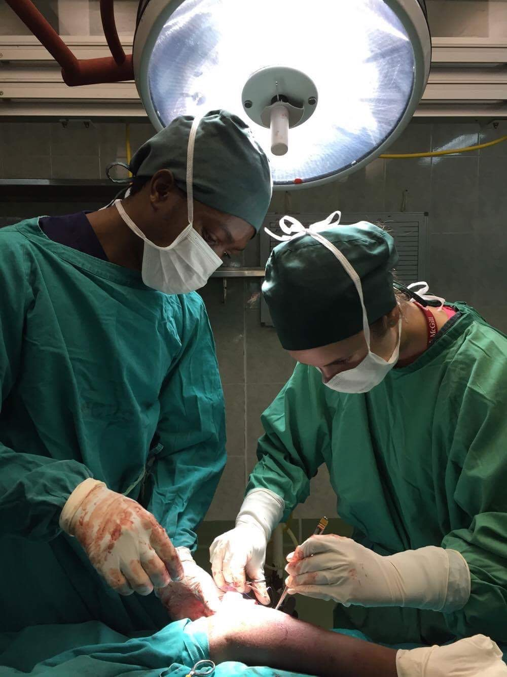 Attached you’ll also find a photo of myself in Tanzania. PLEASE GIVE PHOTO CREDIT TO Alexis Semeschuk (Med-3). I.png