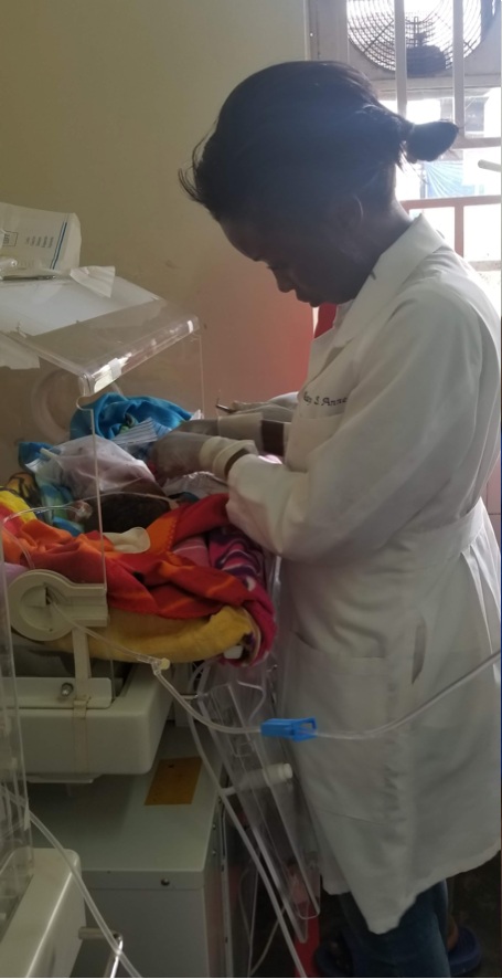 Dr. Wesonga working in the neonatal clinic.
