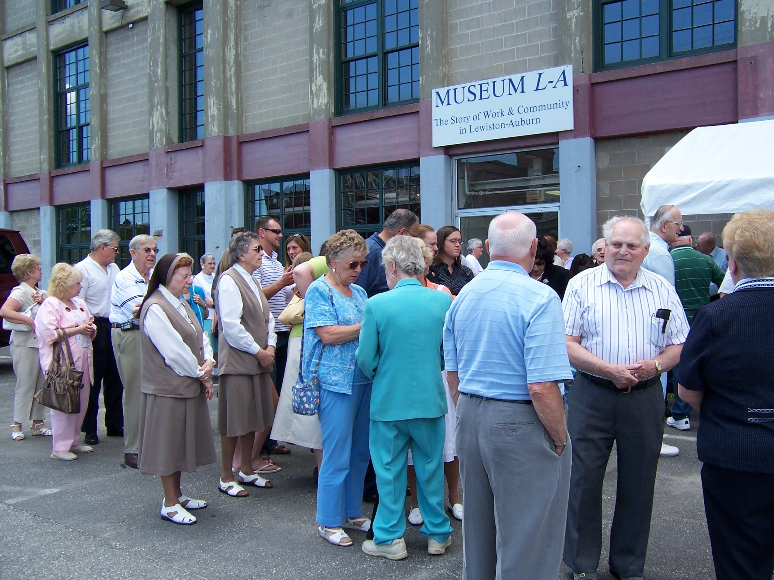 Portraits and Voice--crowd waiting to go in.jpg