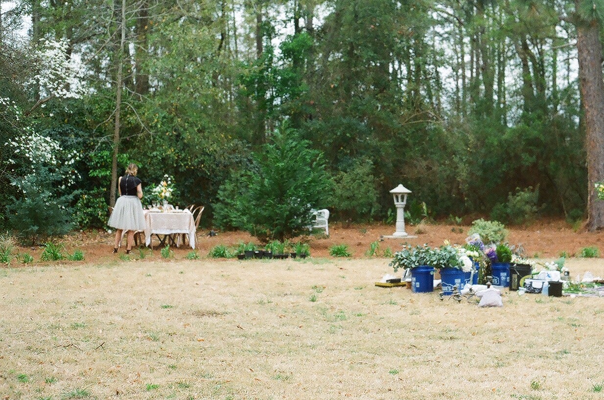 Rachel putting the finishing touches on our styled table.