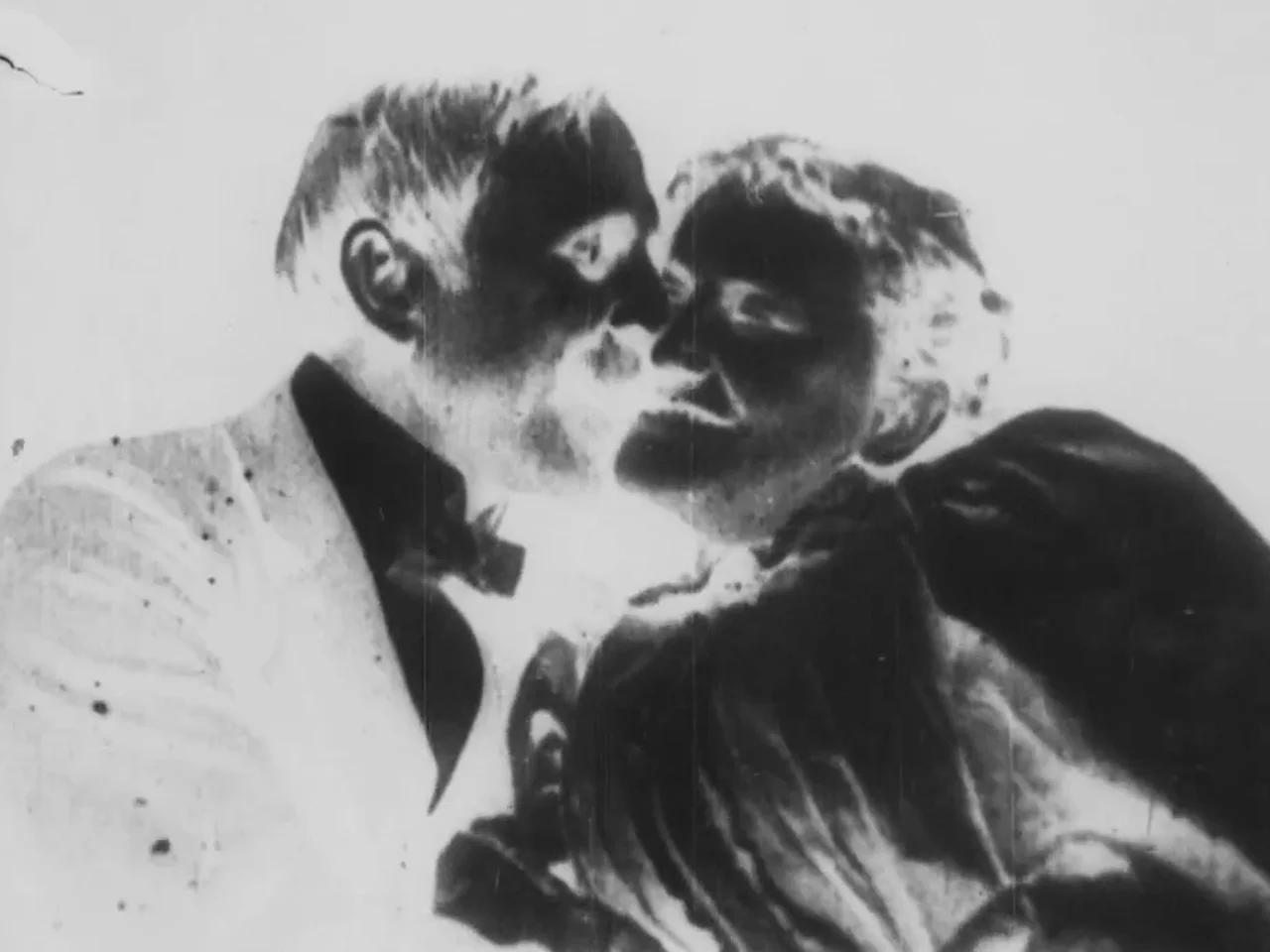 The Kiss Luis Macías 2014 / 9 minutes / Spain / 35mm / sound Based on the film The Kiss (T. Edison 1896) in its original 35mm format, this video-film project is based on a structural re-shooting and re-recording of the original film in all the existing formats: analog, electronic and digital, in an evolutive form. The film is a reiteration of the act of kissing. The emphasis on the kiss, repeated and multiplied, while deteriorated in it’s own progress. The history of the evolution of formats through a kiss. An intimate and aesthetic relationship between media and audiovisual formats. -LM