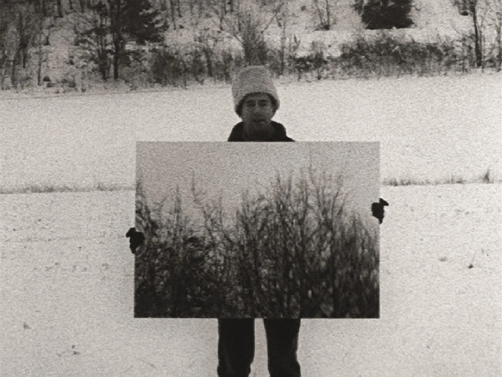 Mirror Robert Morris 1971 | 9 minutes | USA | 16mm | b&w | silent Morris, in a winter landscape, holds a mirror to nature, and to the camera.