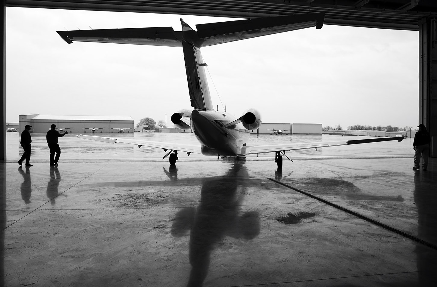 Martin watches as the Cessna Citation CJ2+ jet is moved outside before the flight. " What was unique about it was that with many jobs you don’t see the result until later or at all. When I flew someone and left someplace and landed someplace I felt a sense of accomplishment on the spot."