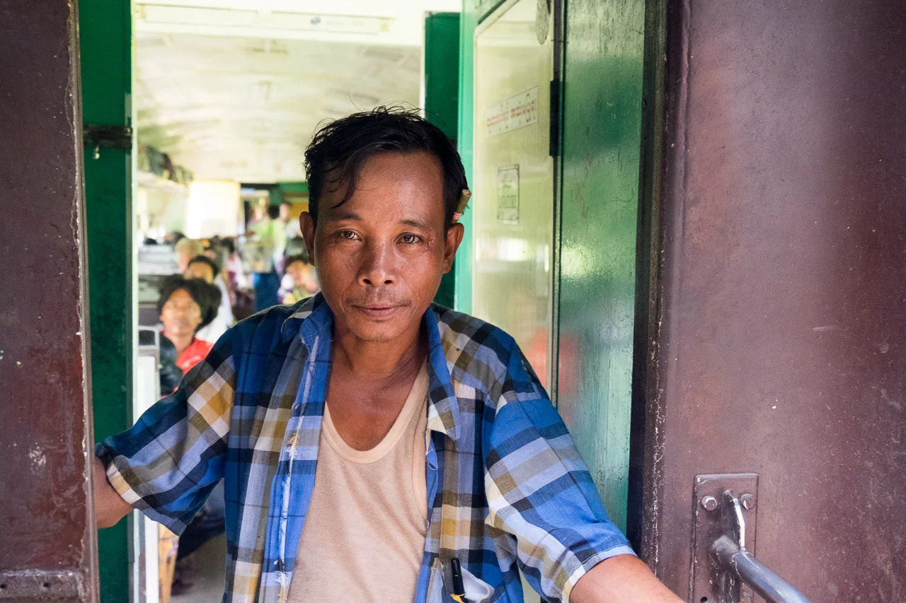  A passenger on the train from Myitkyina in the Kachin State heading towards Mandalay.&nbsp;  Burma 2015 - Francesco Vicenzi Photography 