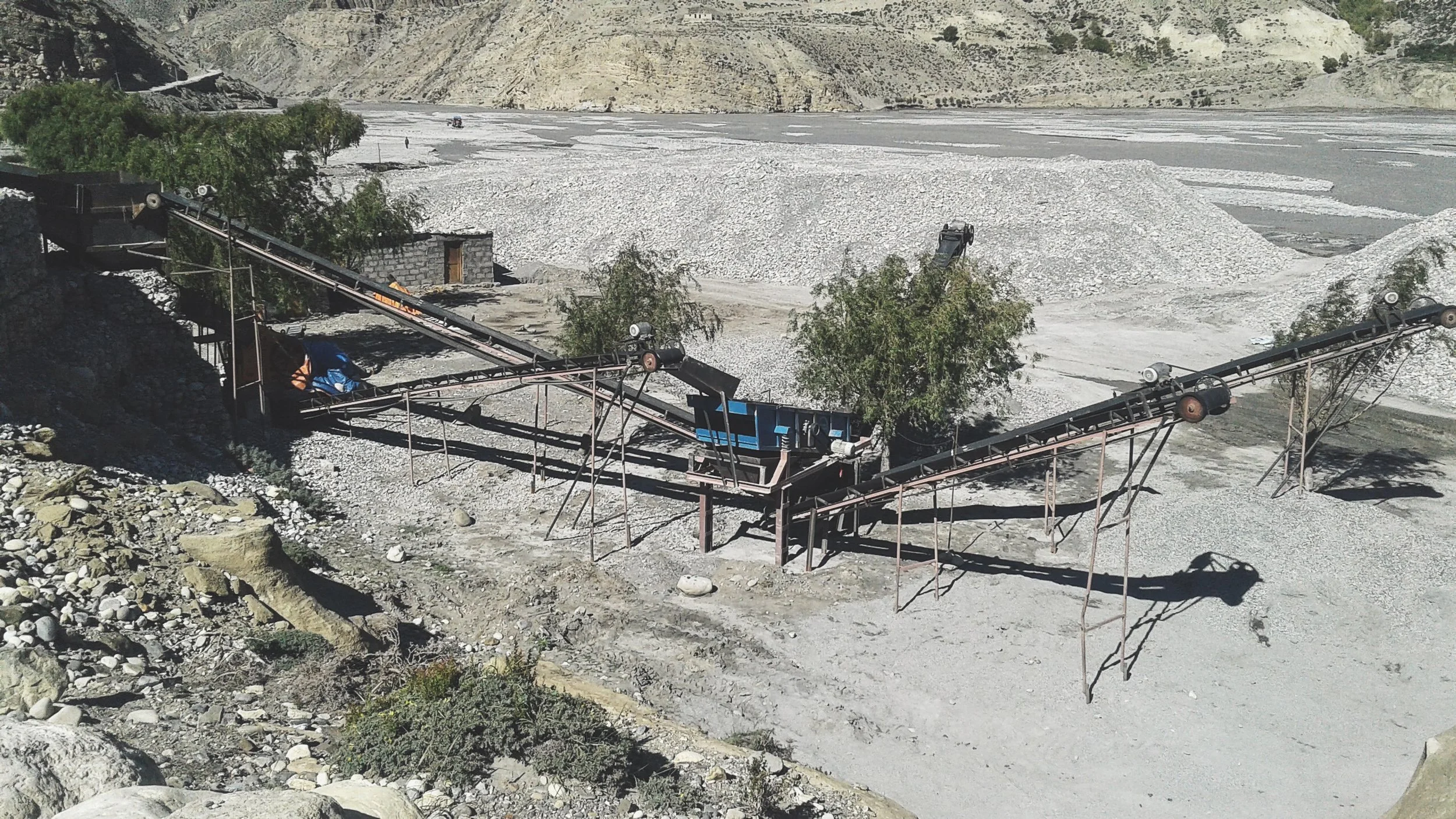 "This machine was installed in 2015 to make cement blocks for building houses. It saves time and reduces man power, but destroys the natural beauty of the area."