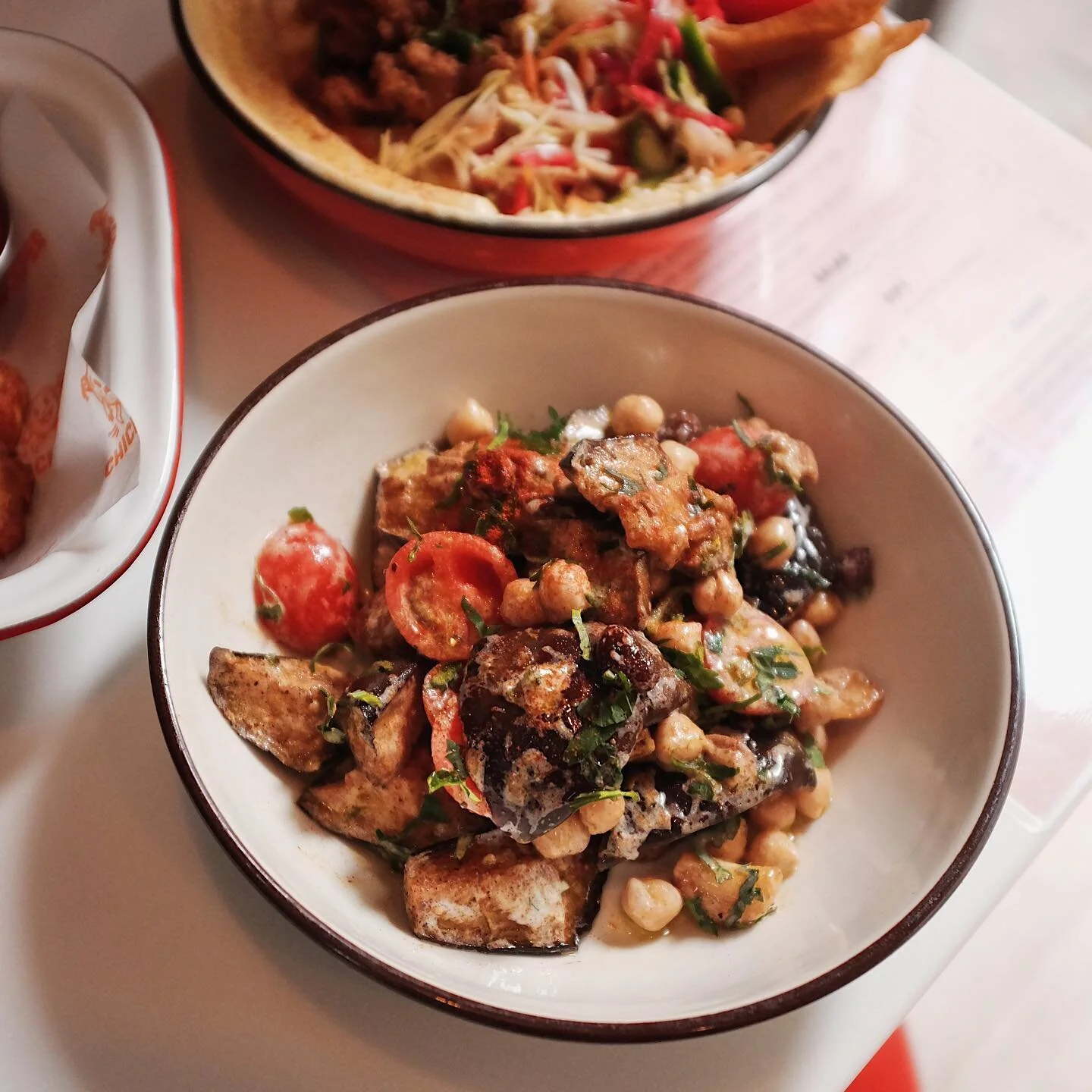 Chickpea&rsquo;s weekly salad for lunch at Mama! Smoked eggplant, sherry raisin 🍇, tomato 🍅 and tahini yogurt 🤤 Never too late to get healthier!