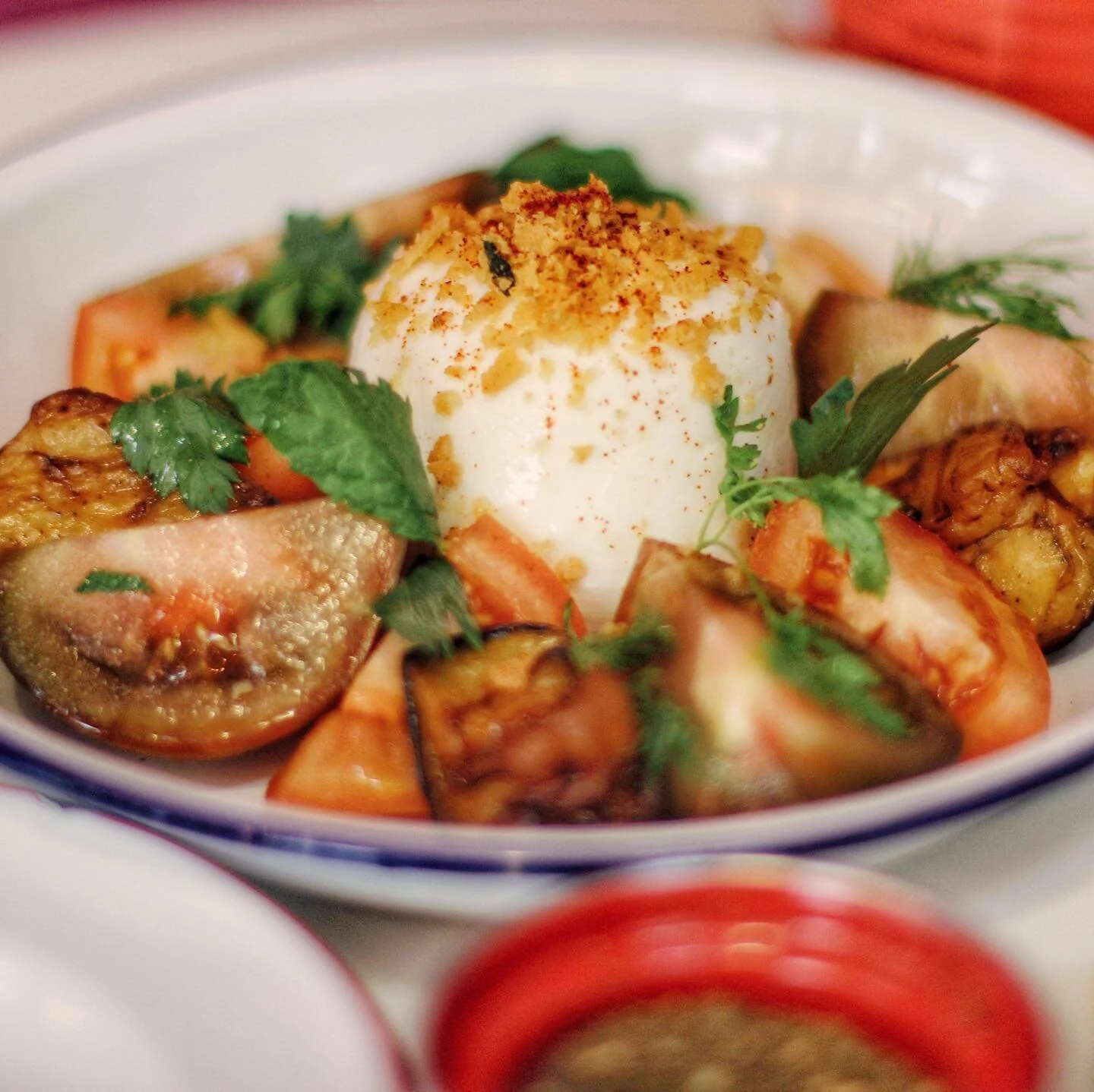 Heavenly, creamy #burrata with baked eggplant and 🍅