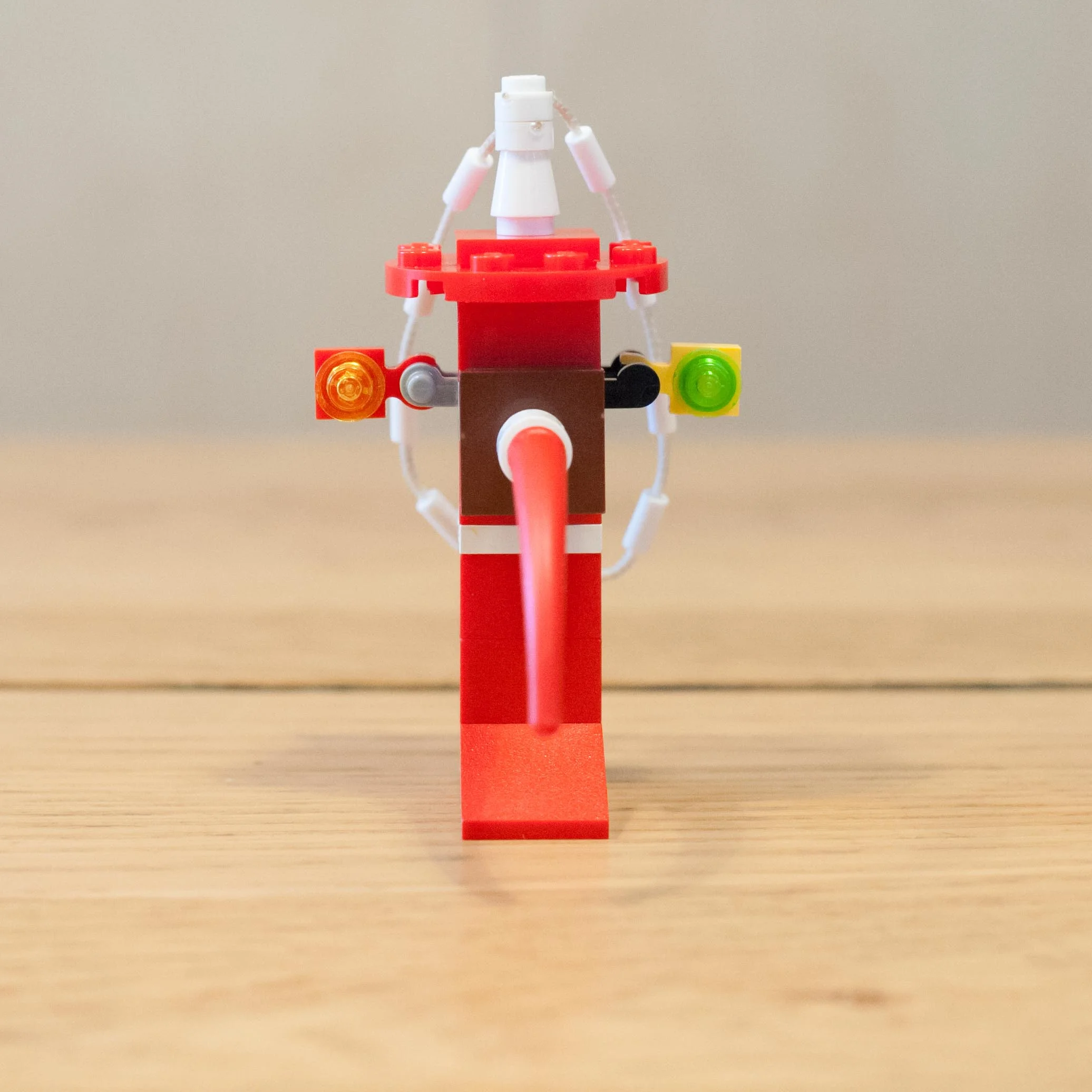 This helpful swinging robot pushes the children on the swings when Mummy is too tired!
