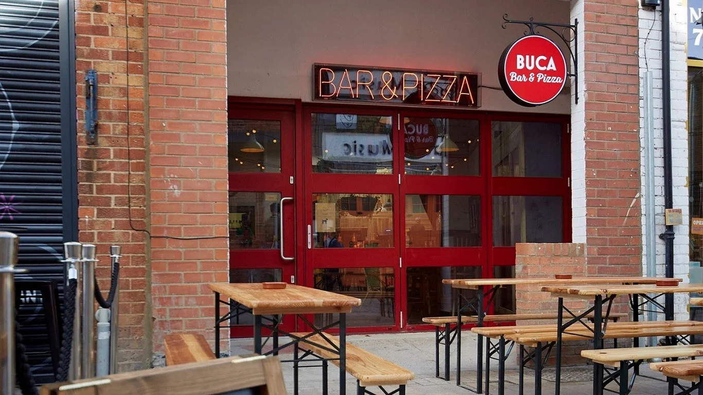 The opening of Buca di Pizza has created 15 full-time and part-time jobs.