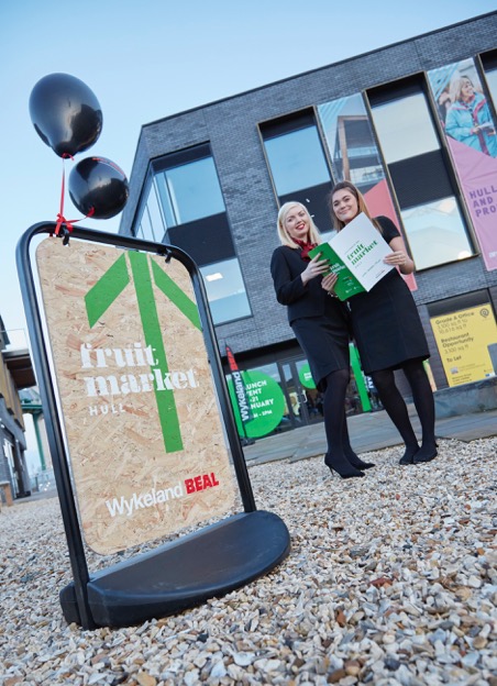 Sales Assistants Emily Douglas, left, and Georgia Slade outside the venue for the Fruit Market residential development launch.