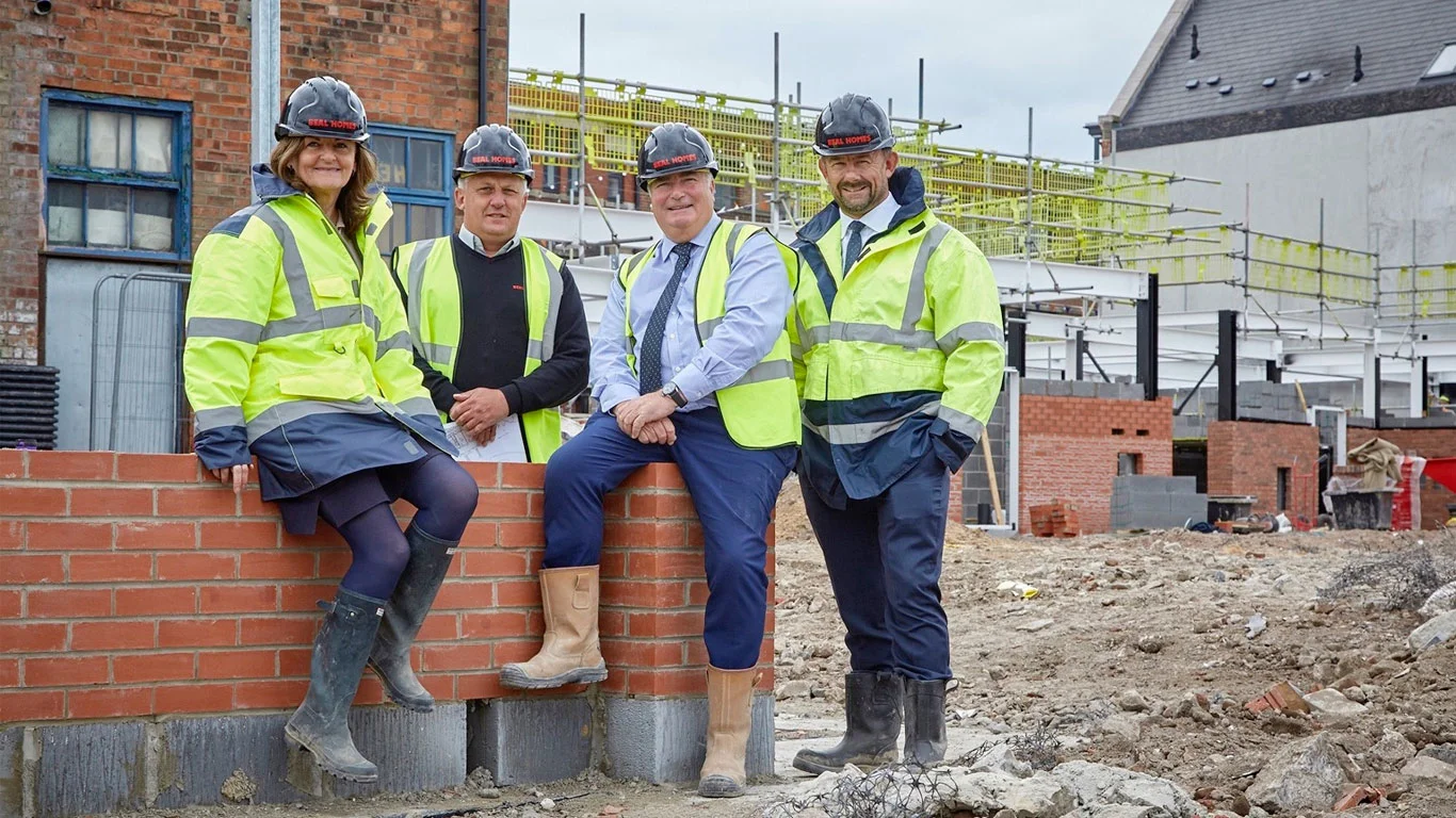 From left, Beal Homes Sales and Marketing Director Sue Waudby, Site Manager John Ellis, Construction Director John Goodfellow and Chairman and Managing Director Richard Beal at Wykeland Beal’s residential development site in Hull’s Fruit Market.