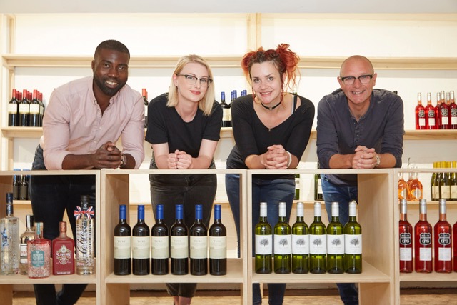 Owners Phil Benson, left, and Jonathan Elvidge with Sales Assistant Beth Hall, second left, and Manager Katherine Gregory inside The Store on Pier Street, which will stock speciality wines and spirits, as well as locally-sourced food items and daily essentials.