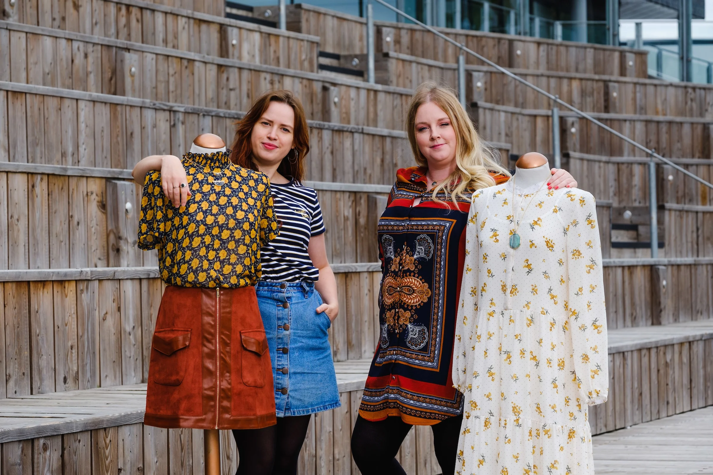 Owner Nicola Gibbons, right, and Manager Anna Carter pictured at the Stage @TheDock venue in the Fruit Market with examples of the fashions that will be stocked when Tessies opens in the thriving waterside quarter.