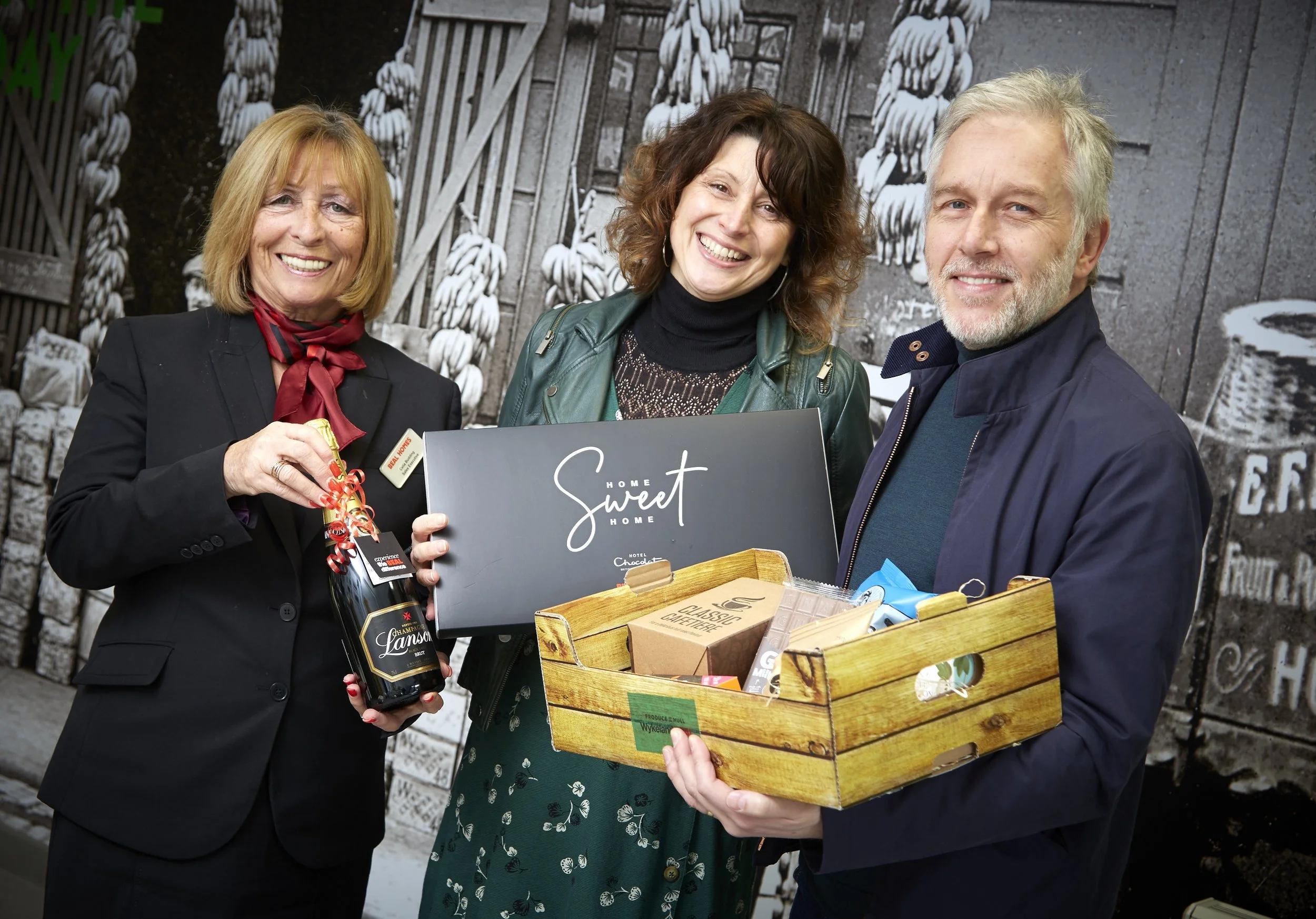 The first residents of the new Fruit Market community, Steve Copeman and Claire Bell, with a welcome hamper to celebrate moving into their new property.